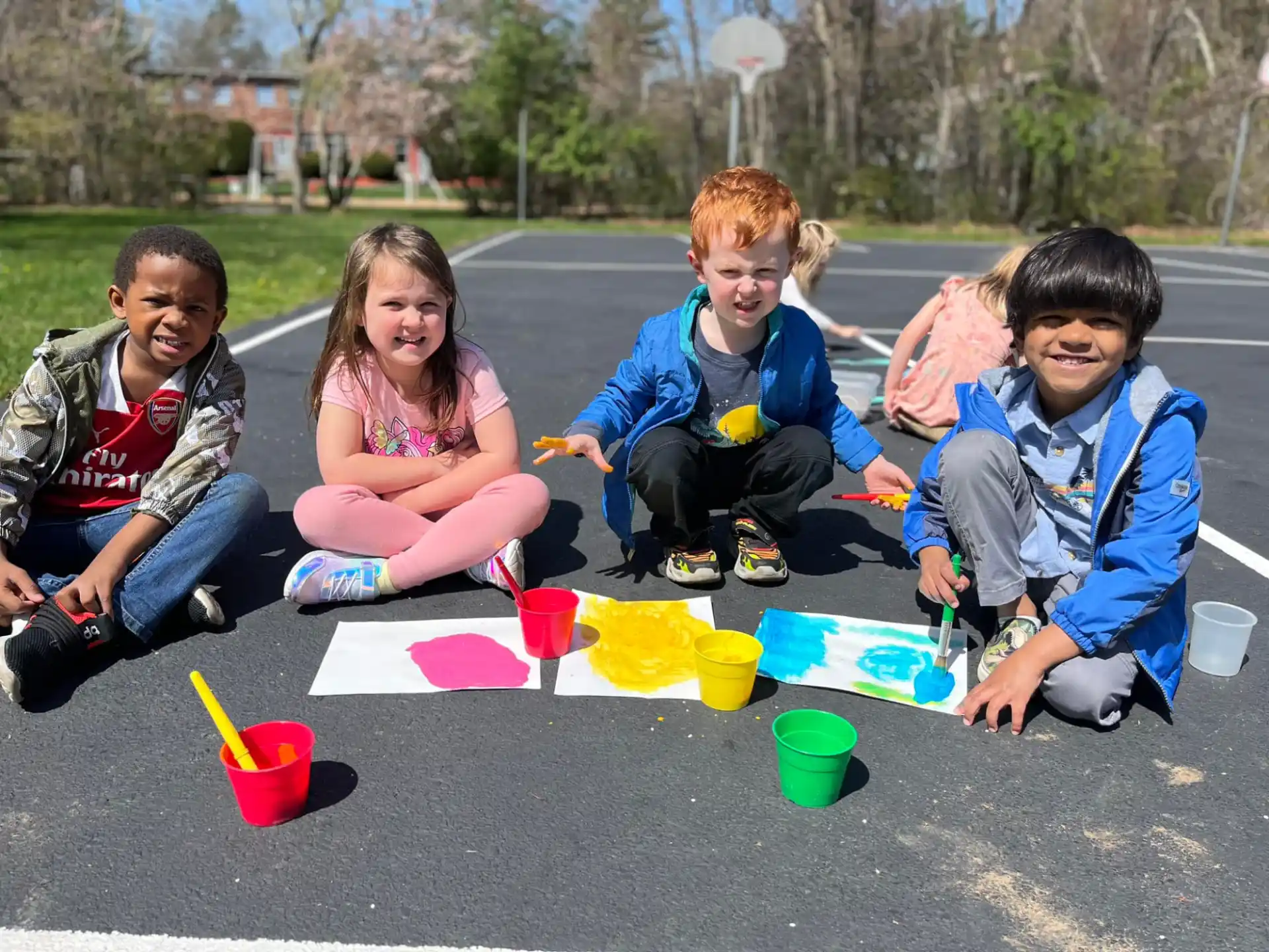 a group of kids painting