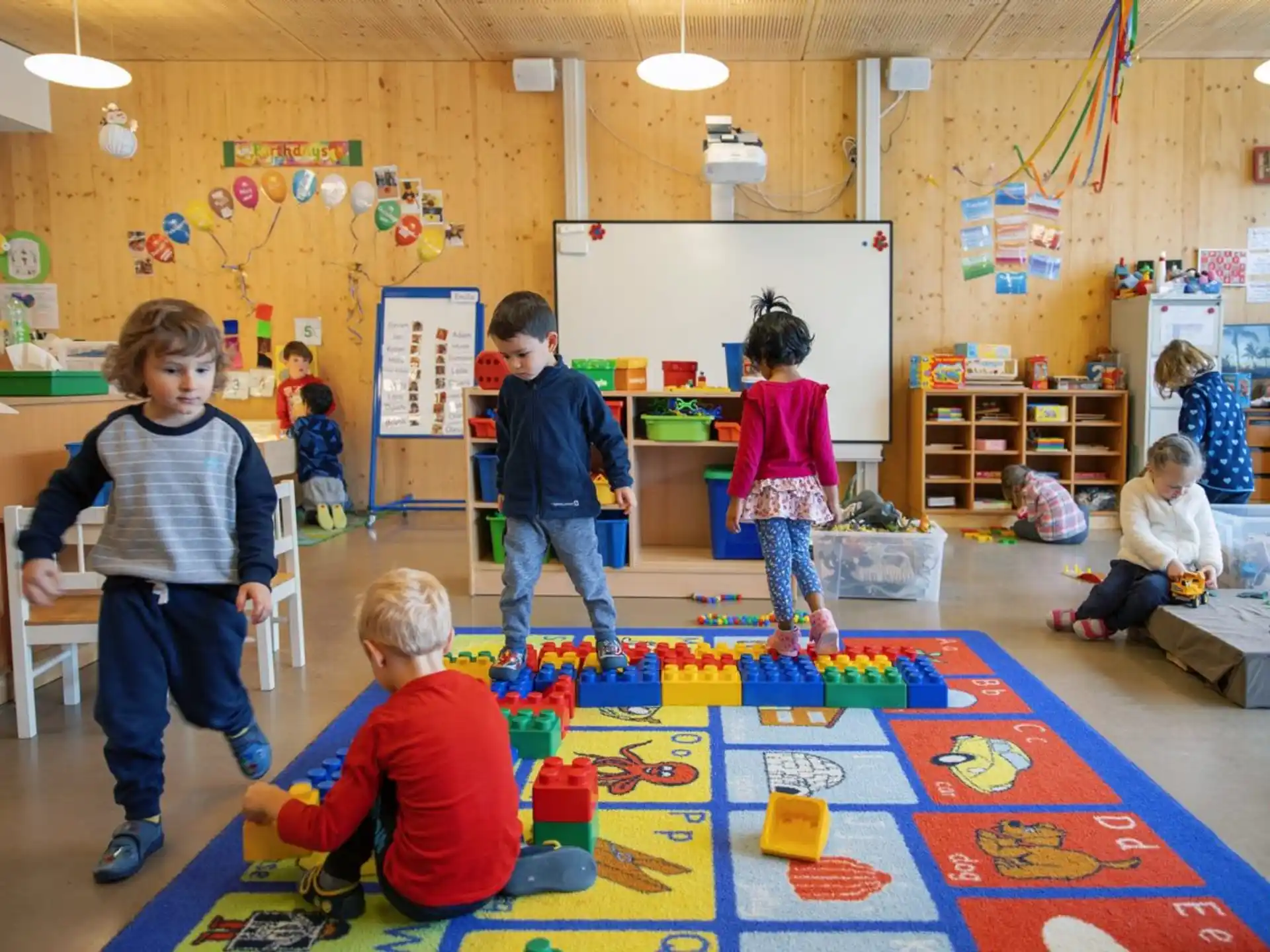 children playing with toys in a classroom