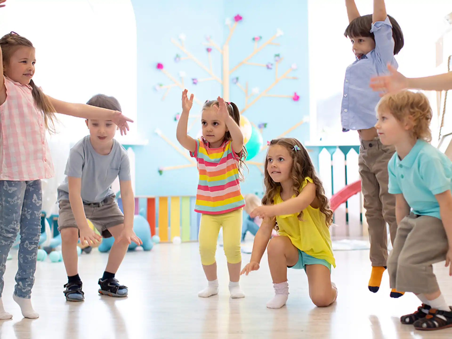 a group of children playing with bubbles