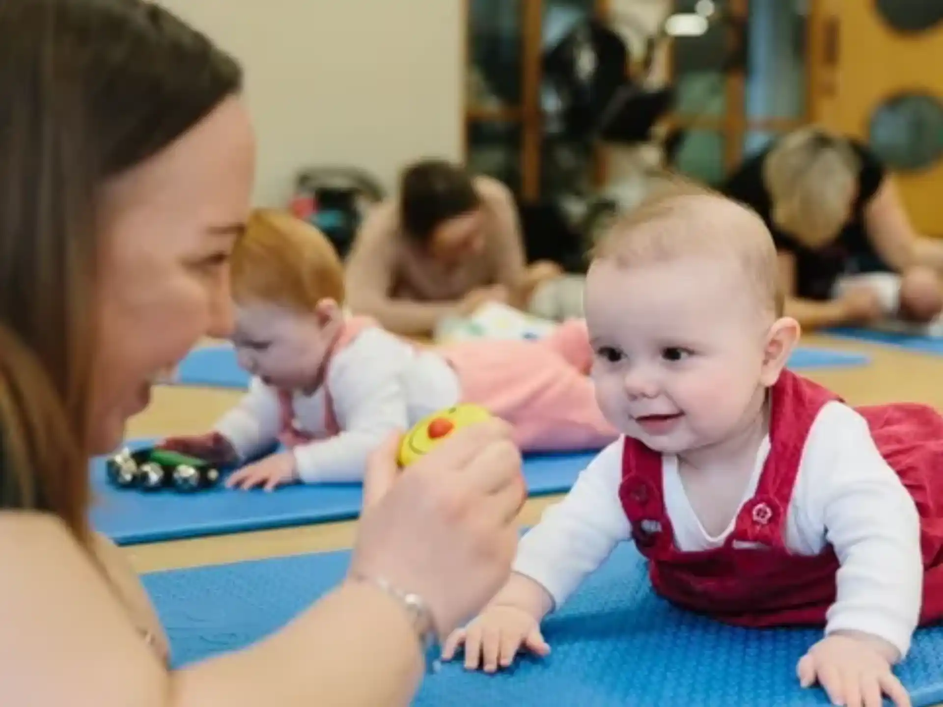 a person holding a baby