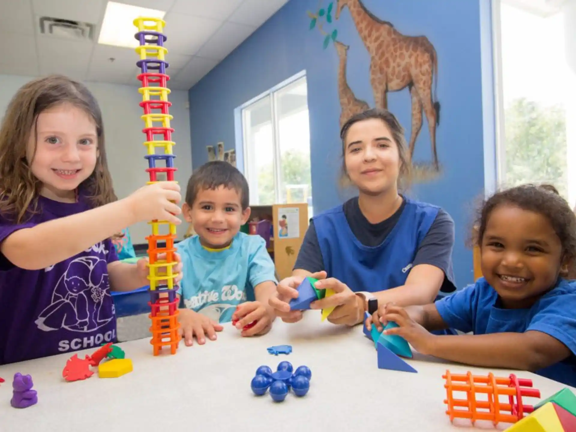 a group of children playing with toys