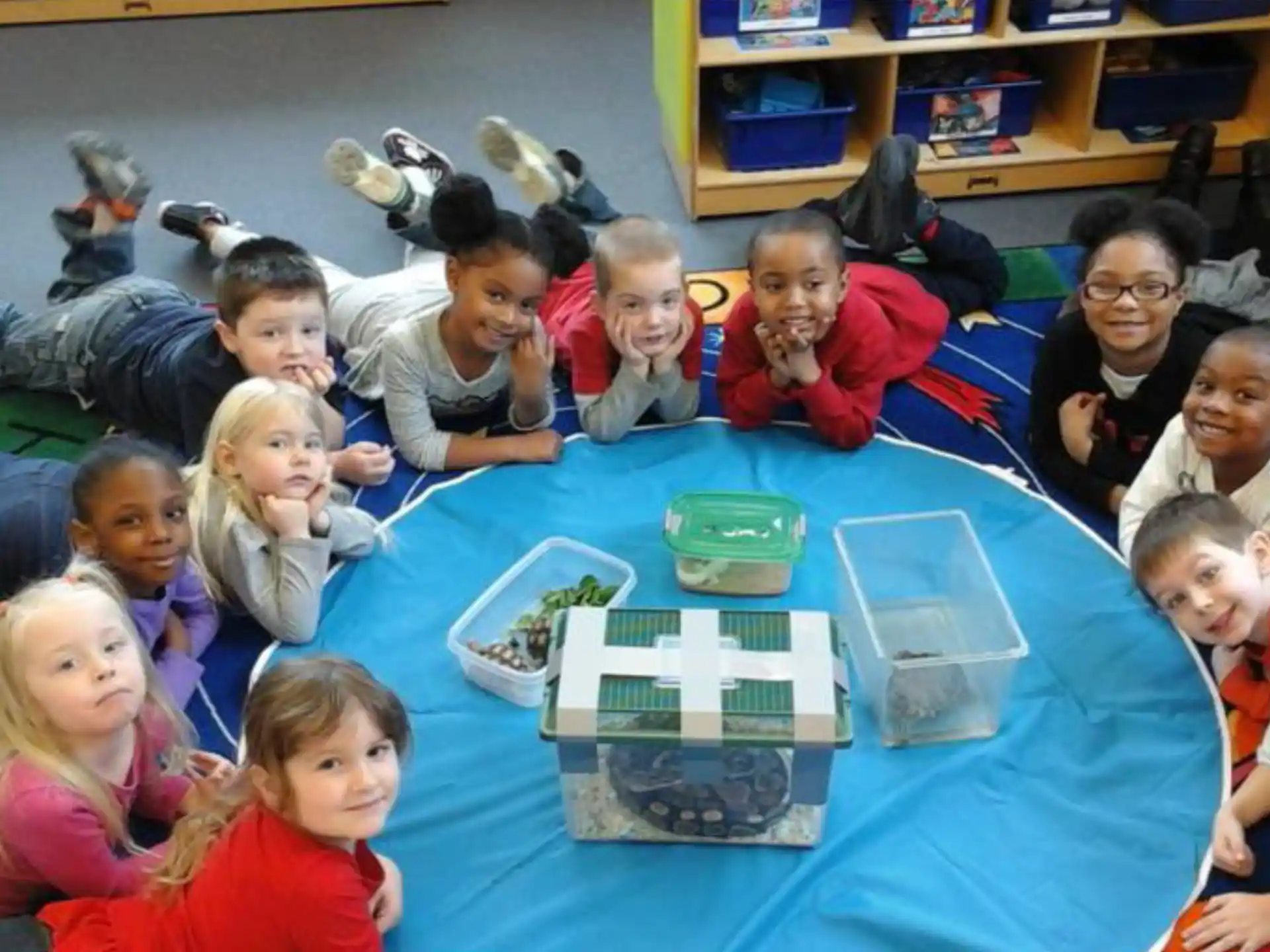 a group of children sitting on the floor