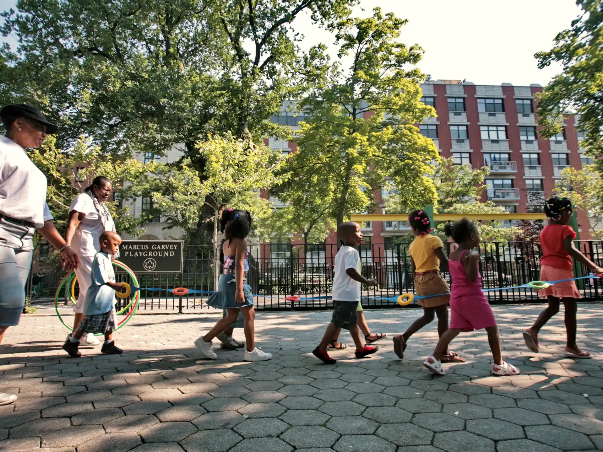 a group of people playing tennis