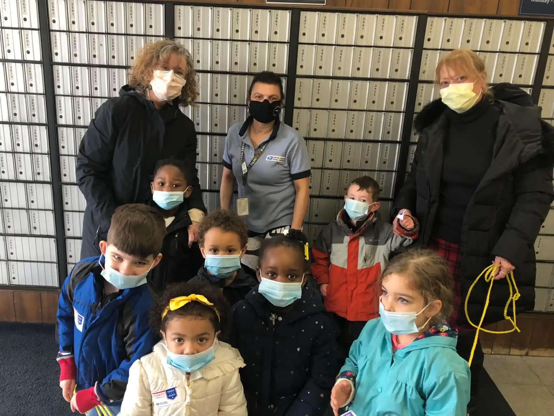a group of people wearing masks
