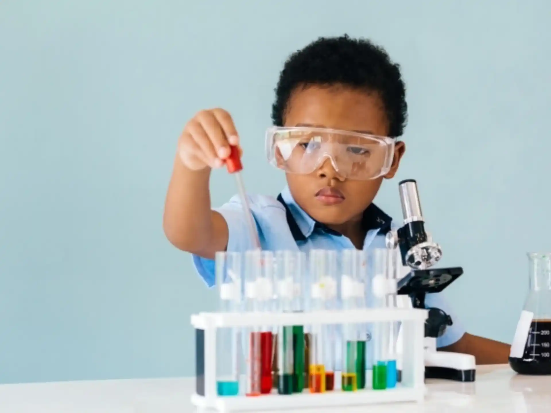 a young boy wearing safety goggles