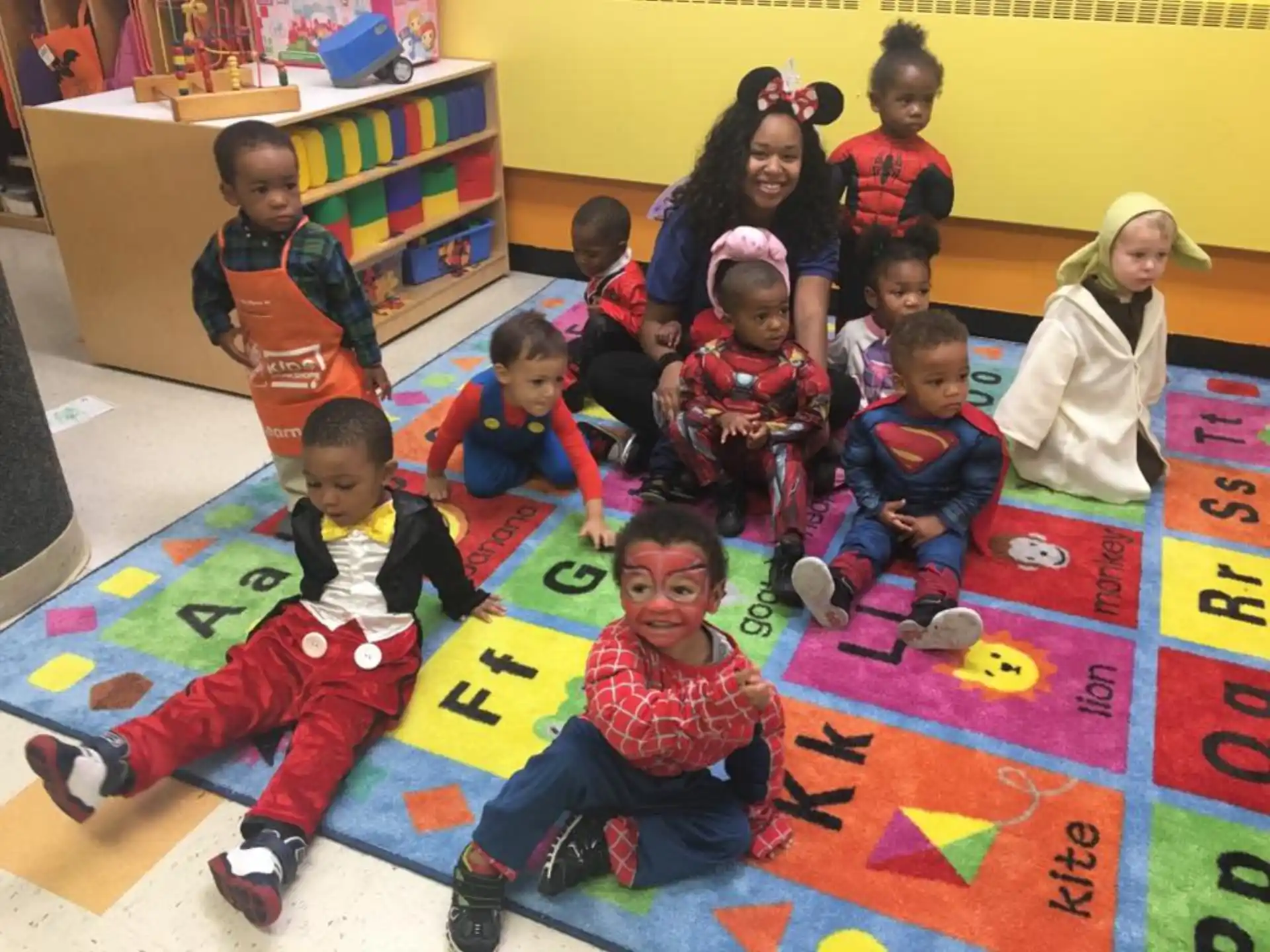 a group of children sitting on the floor