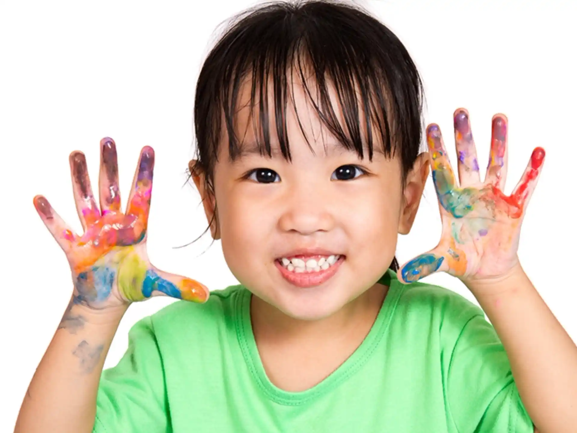 a child with their hands up