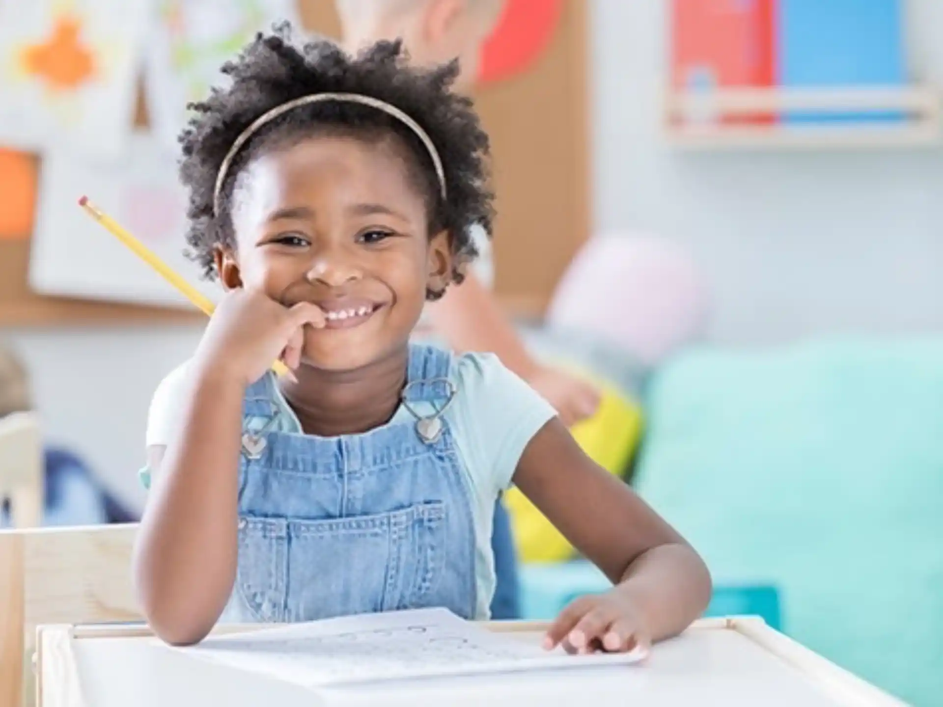 a young girl smiling