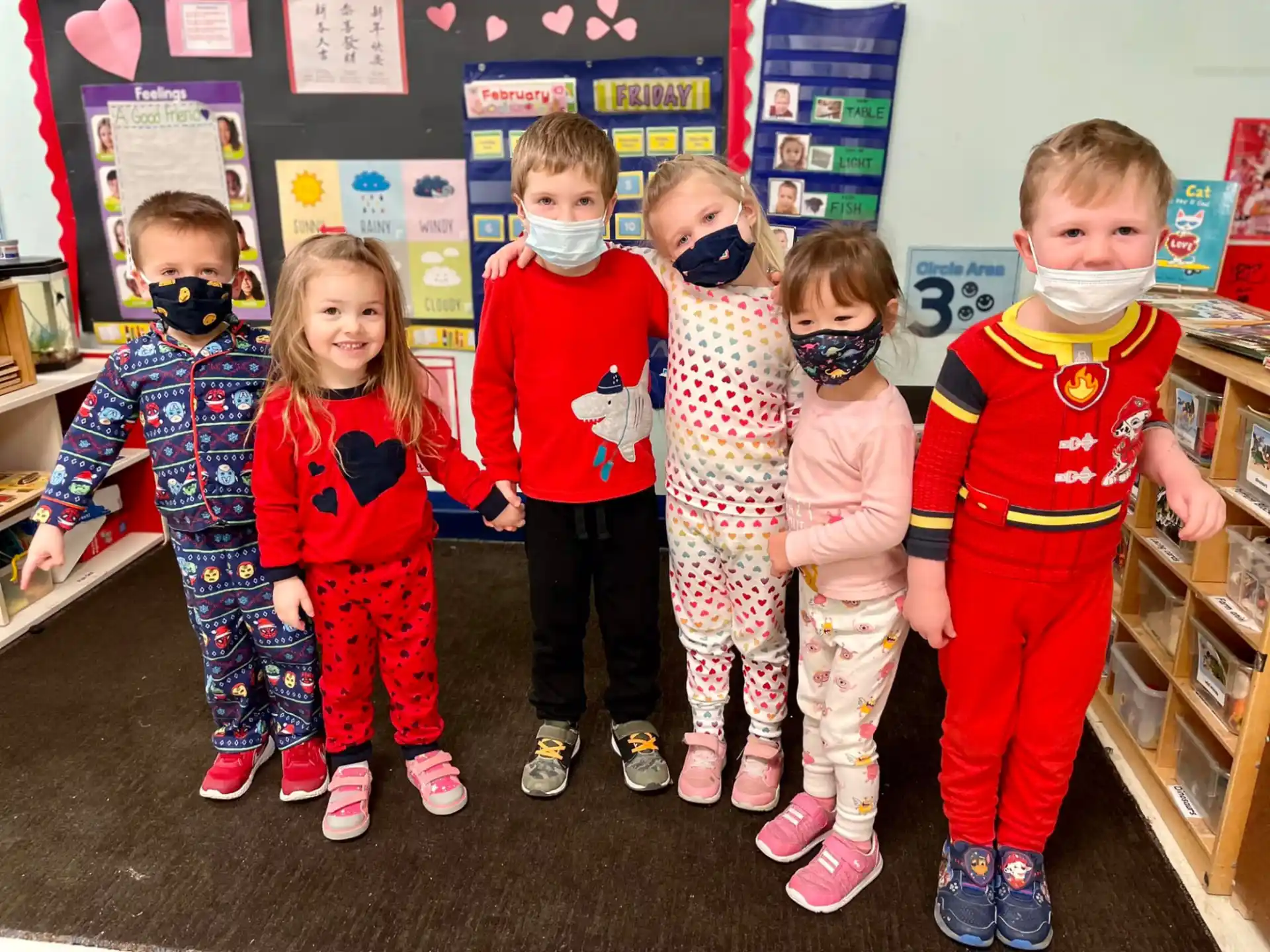 a group of children wearing clothing