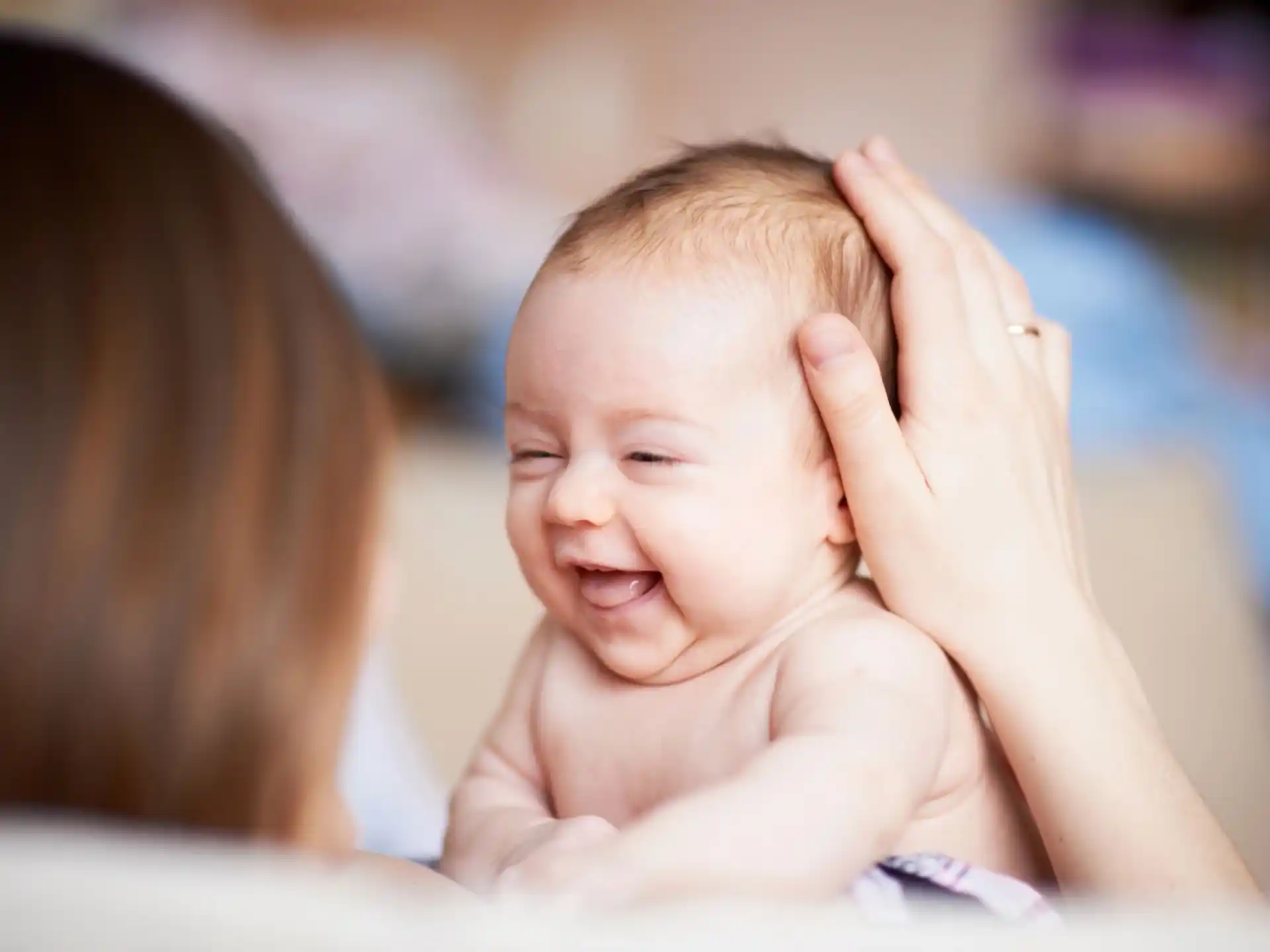 a person holding a baby