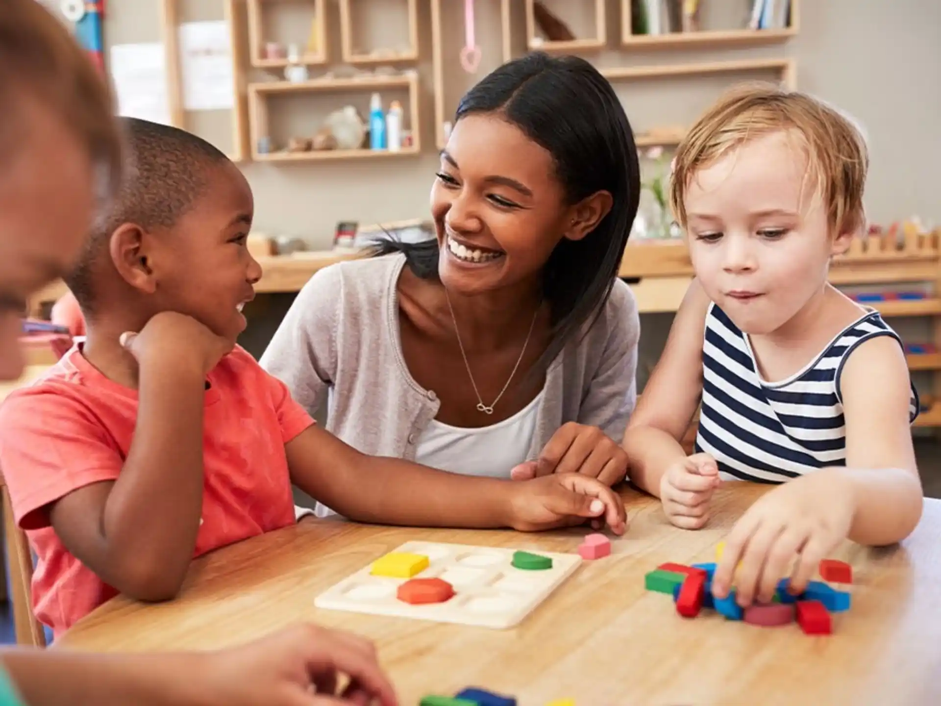 a person and children playing with toys