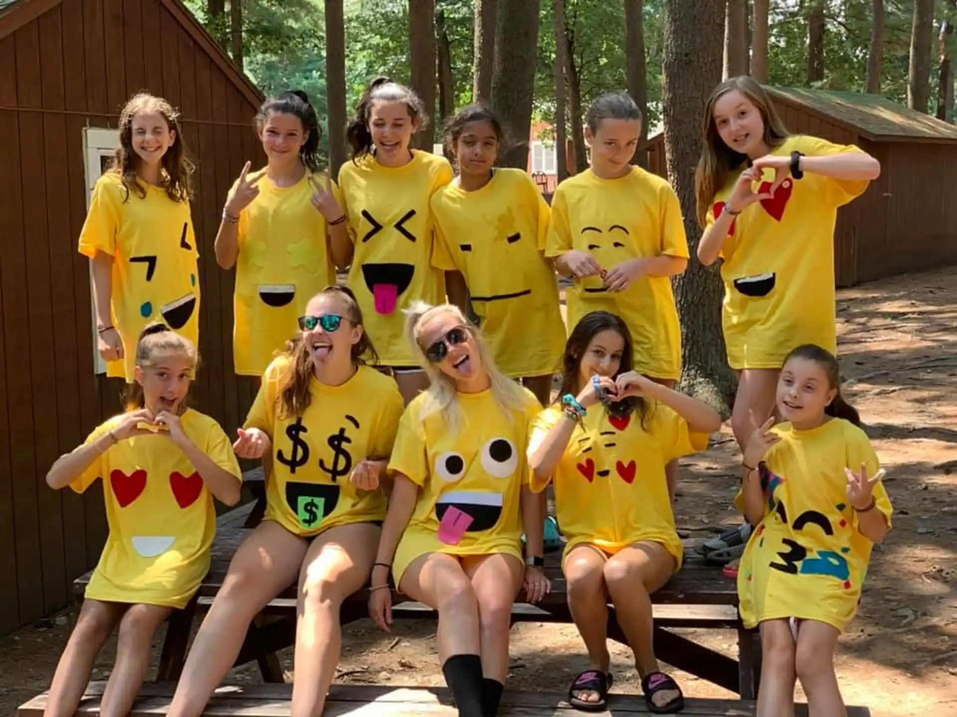a group of people wearing yellow shirts