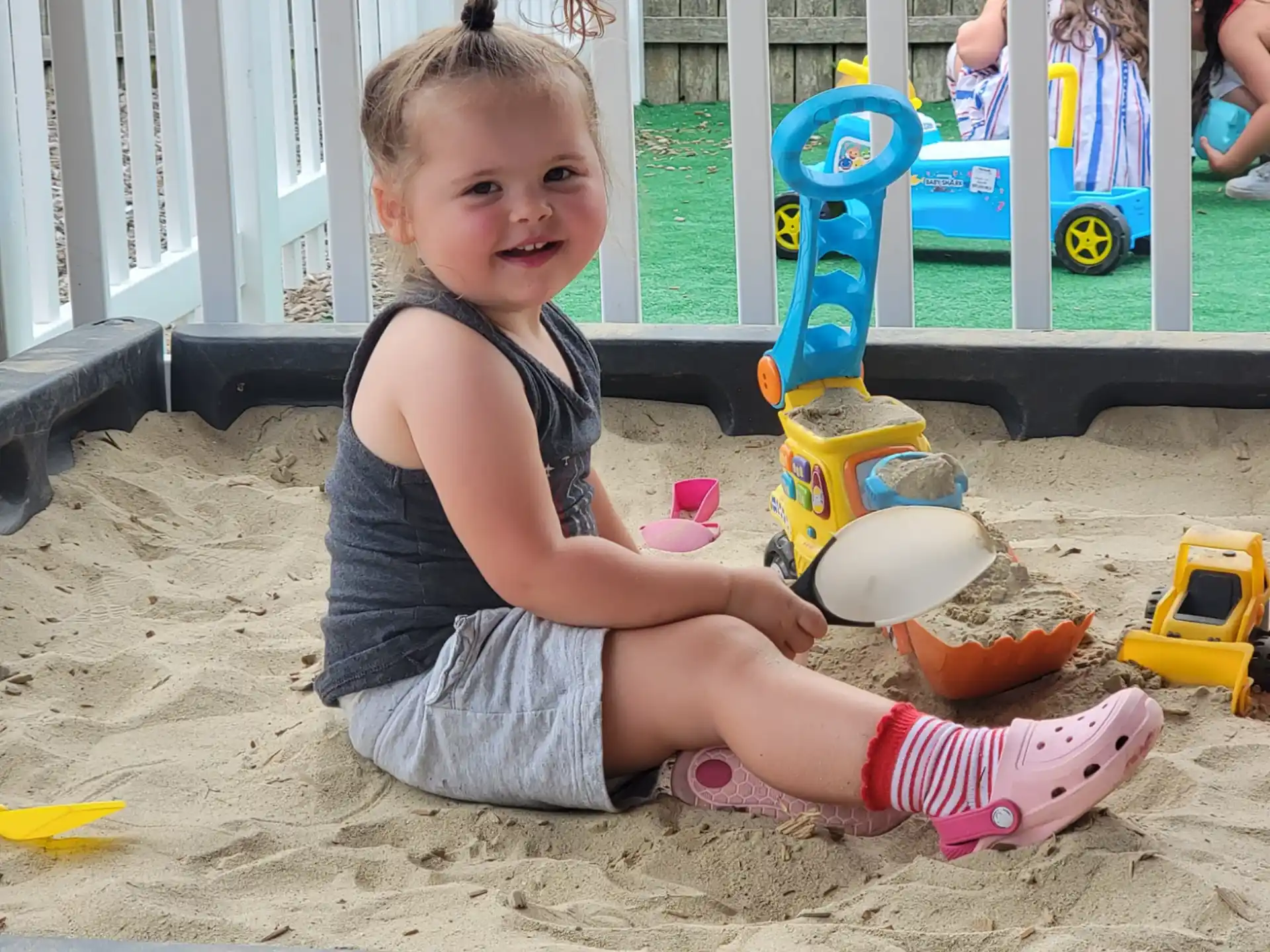 a child playing in sand