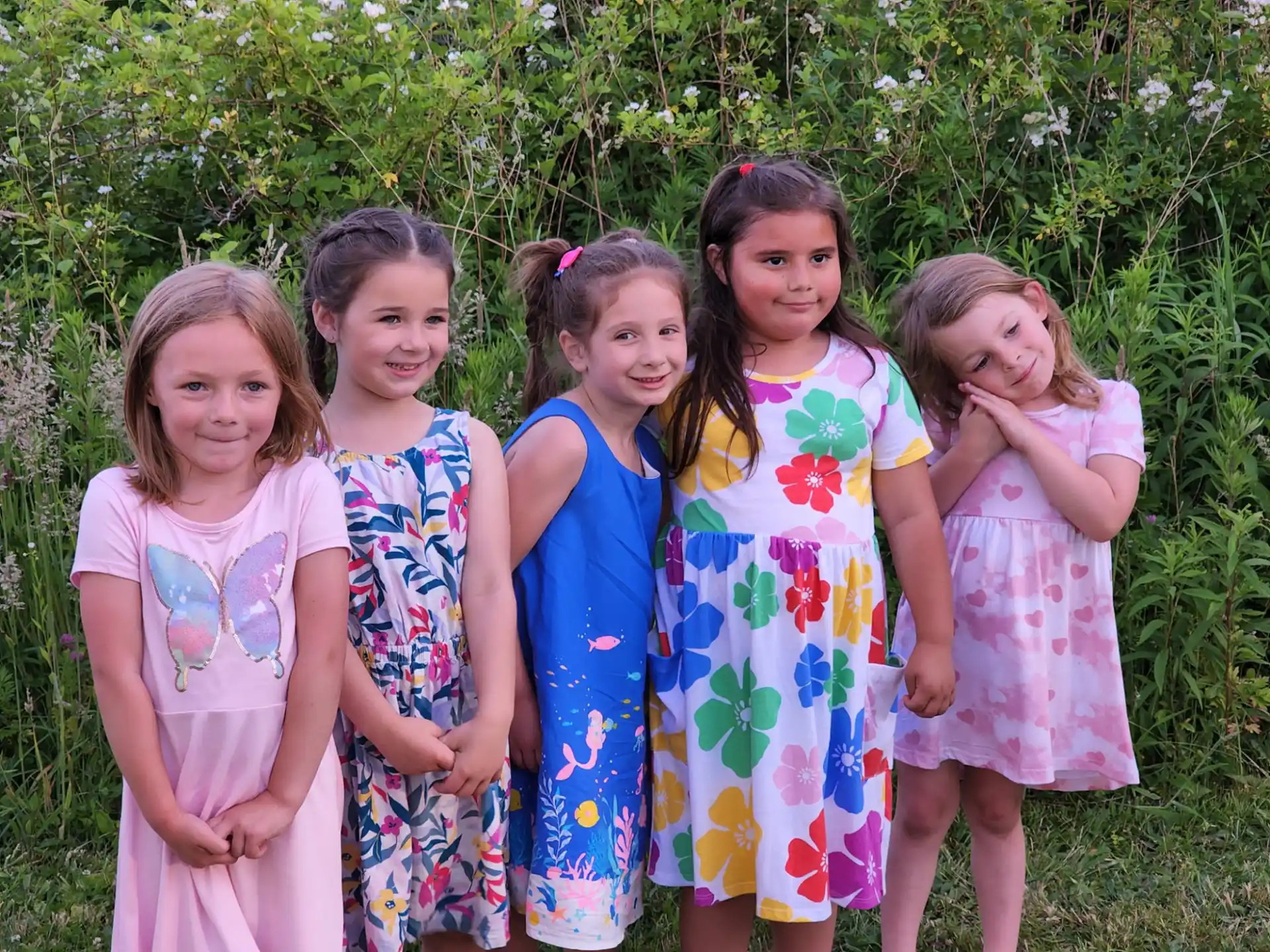 a group of girls posing for a photo