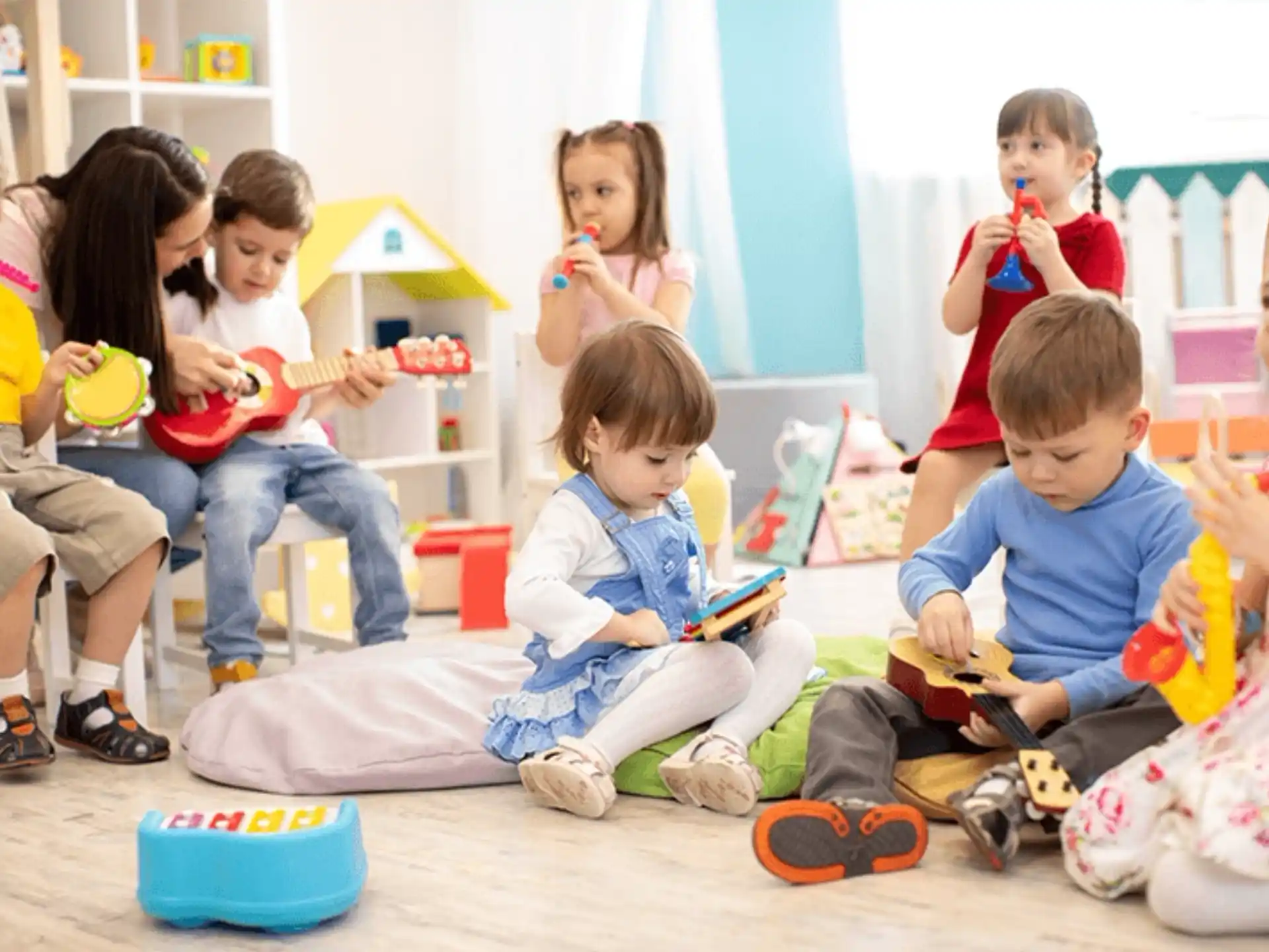 a group of children sitting on the floor