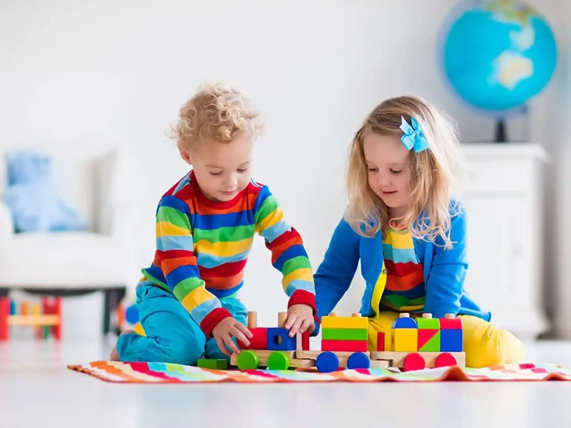 a couple of children playing with toys