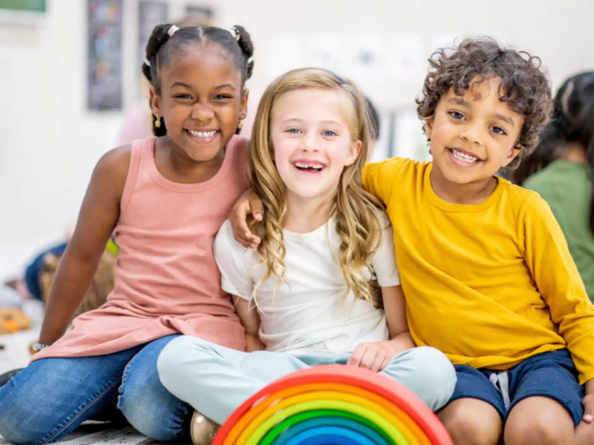 a group of children sitting on the floor