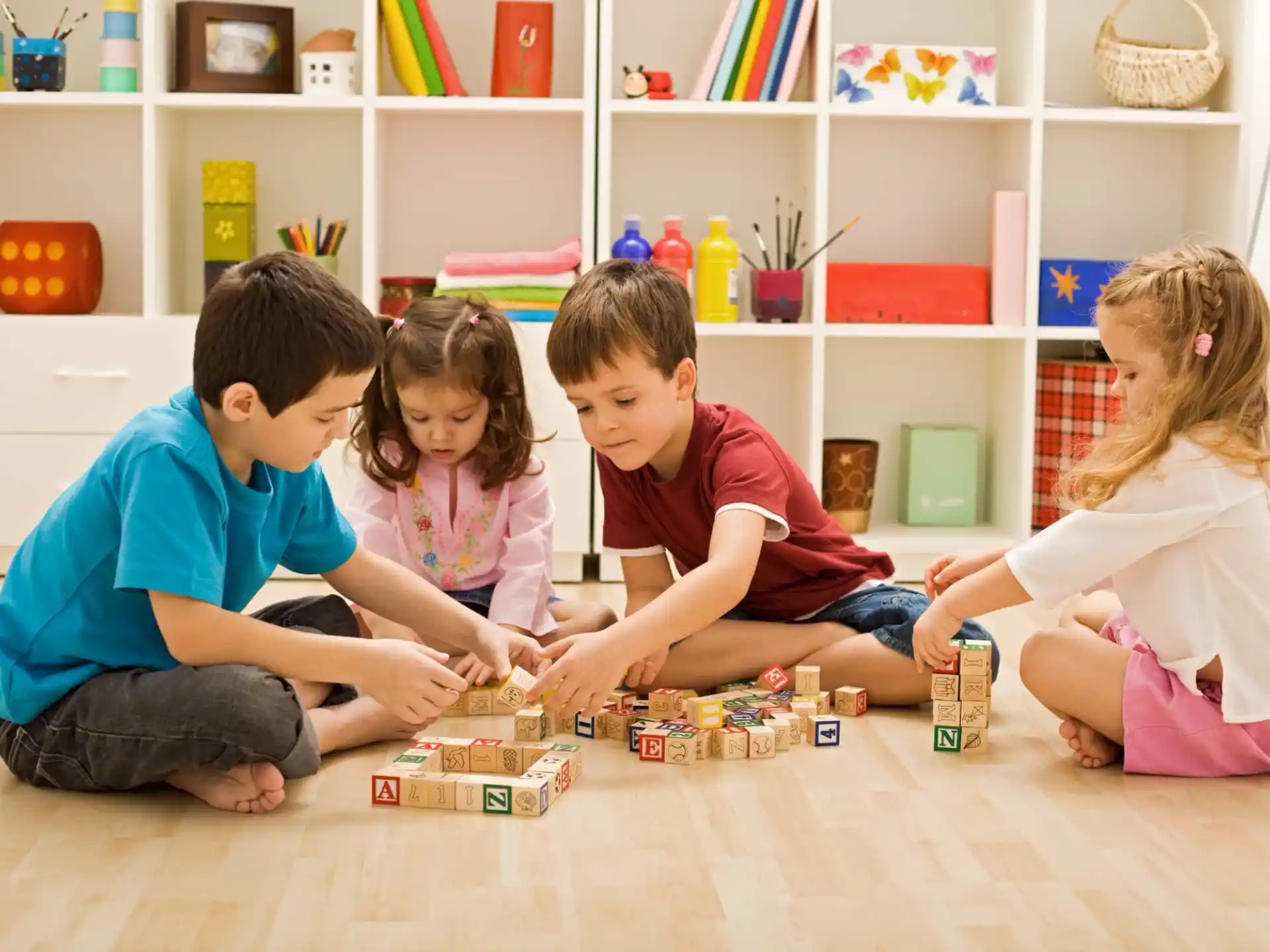 a group of children playing with toys