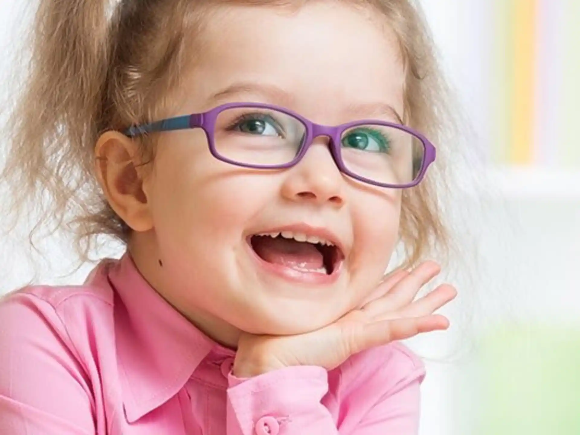 a baby wearing glasses