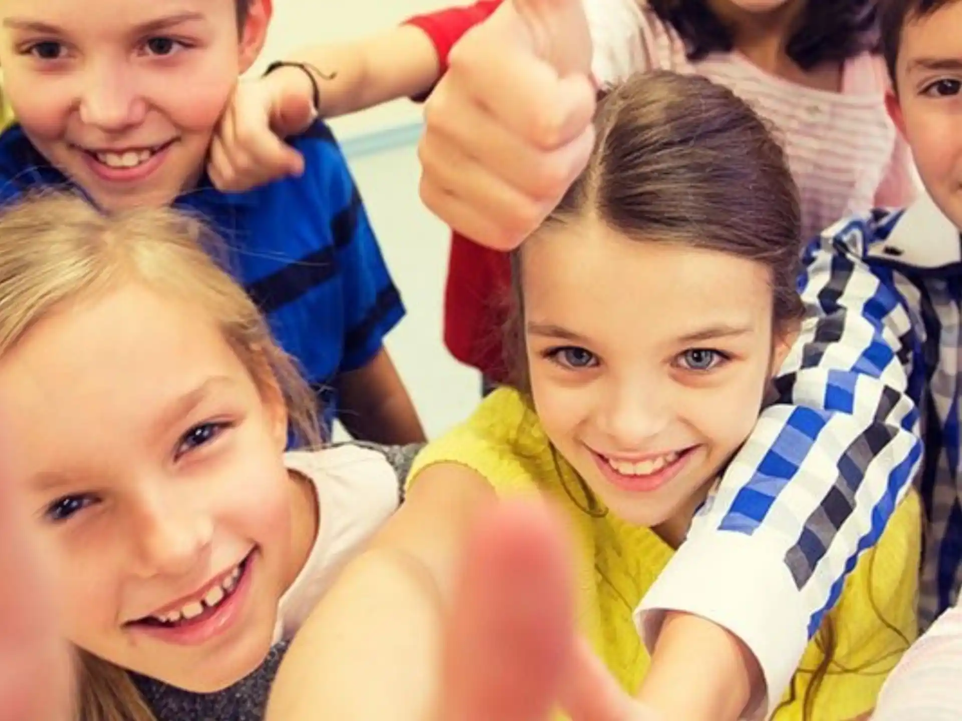 a group of children smiling