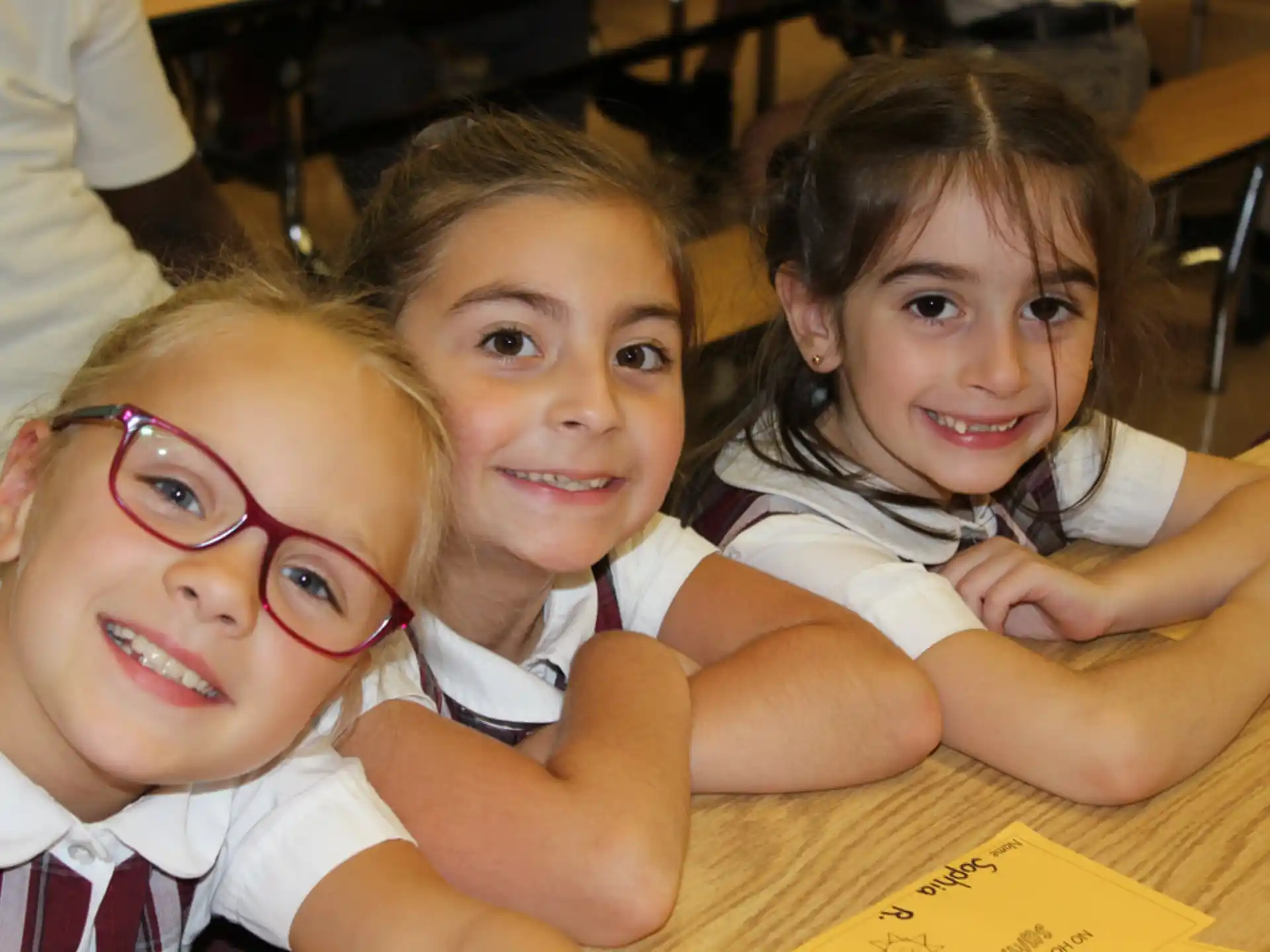 a group of girls posing for a photo