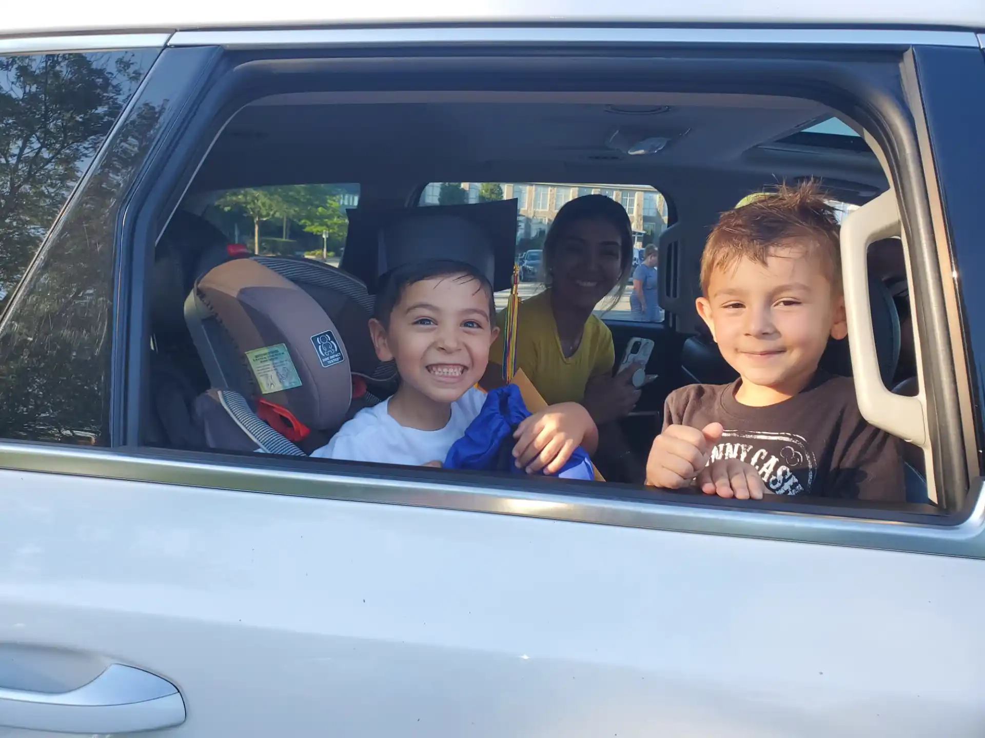 a group of kids in a car