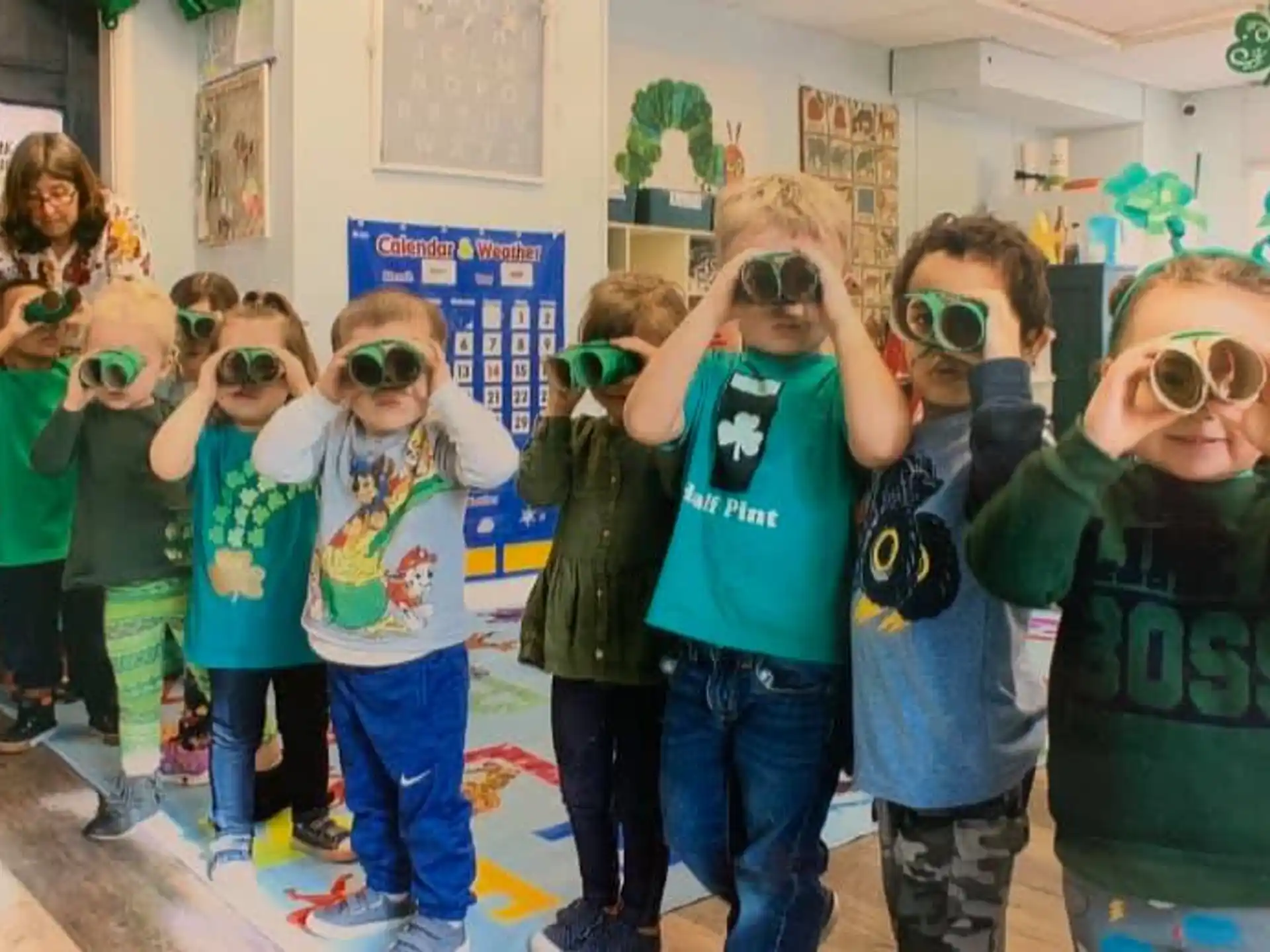 a group of children wearing masks