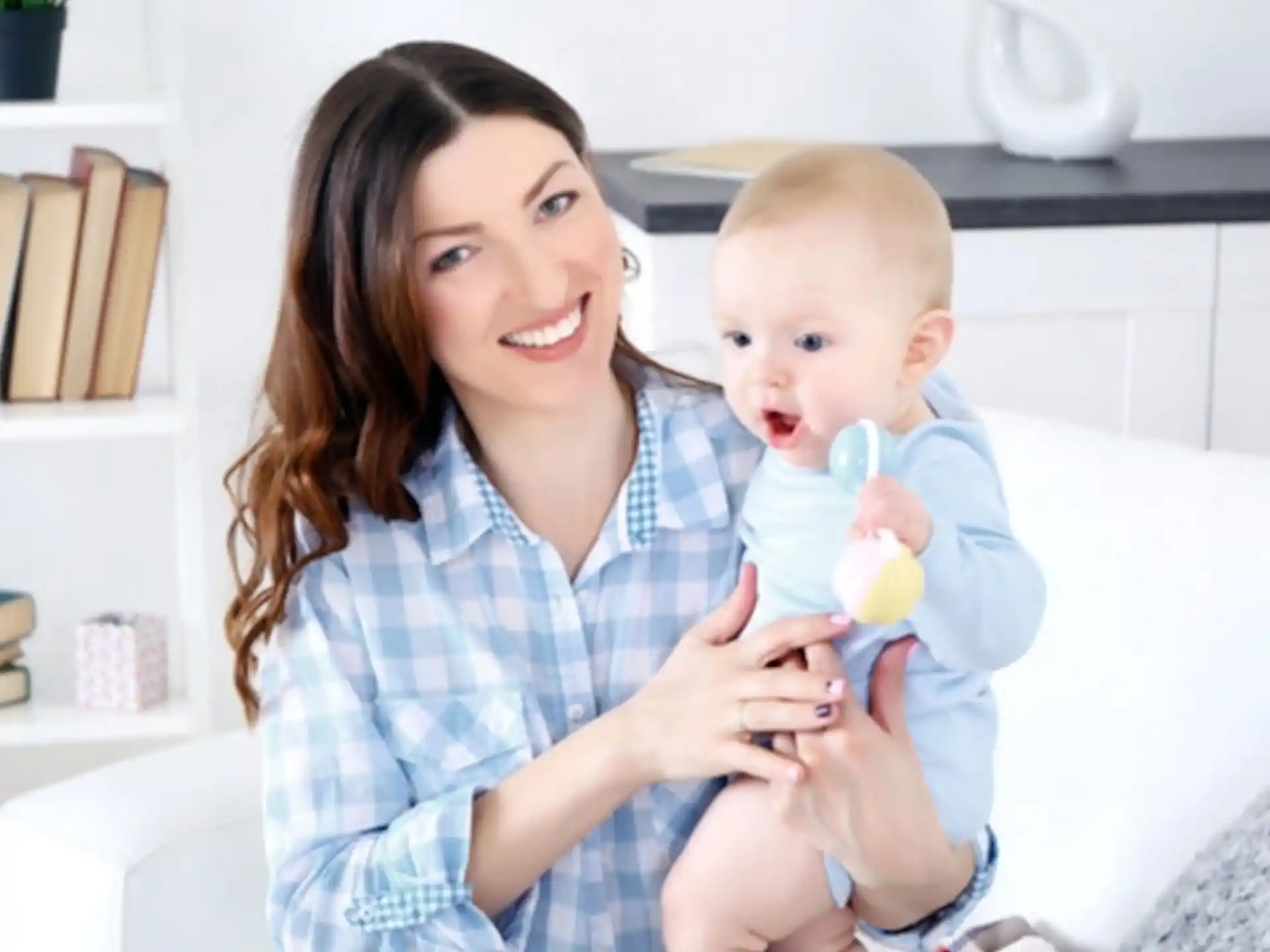 a person holding a baby