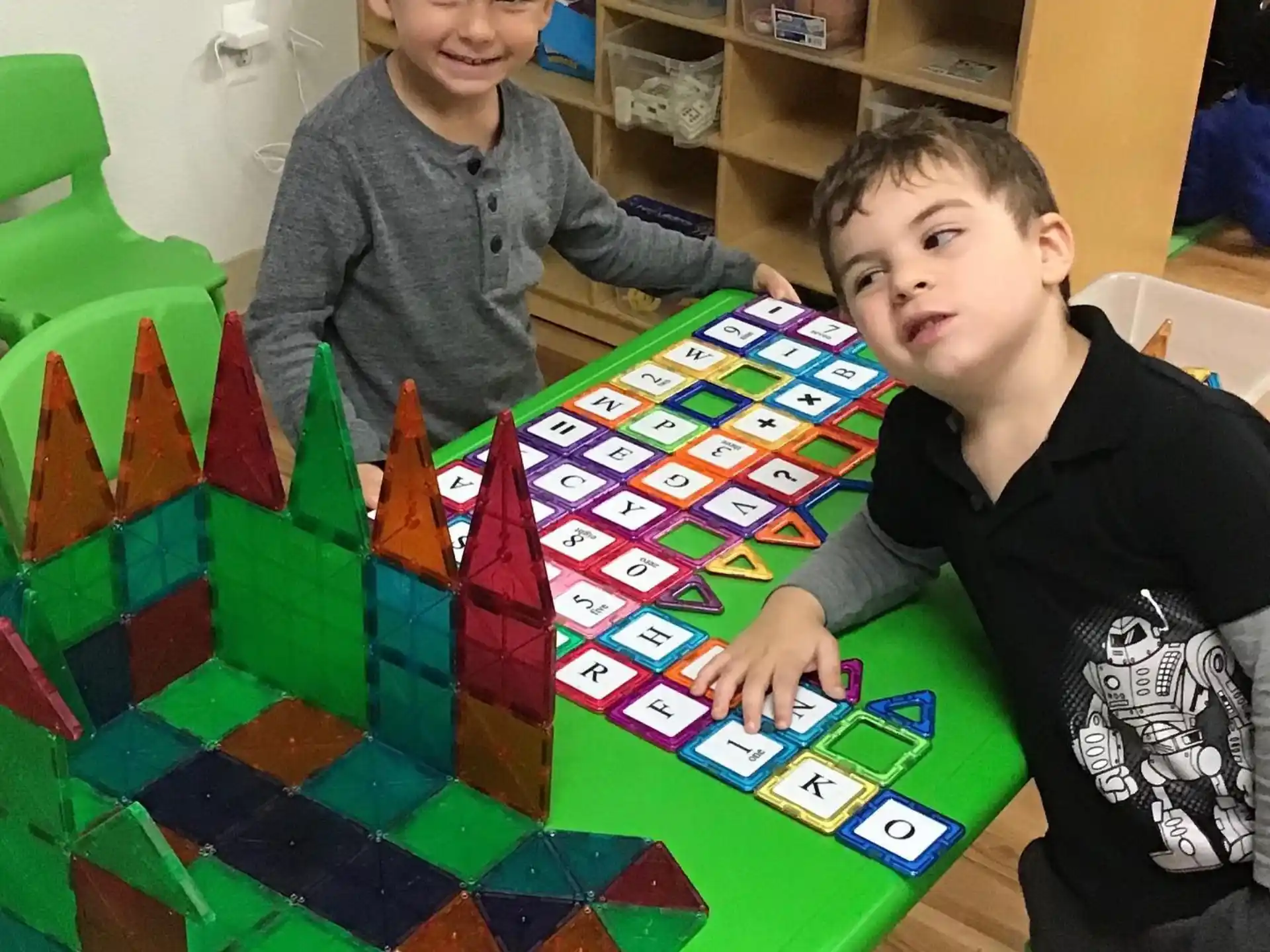 two boys playing a board game