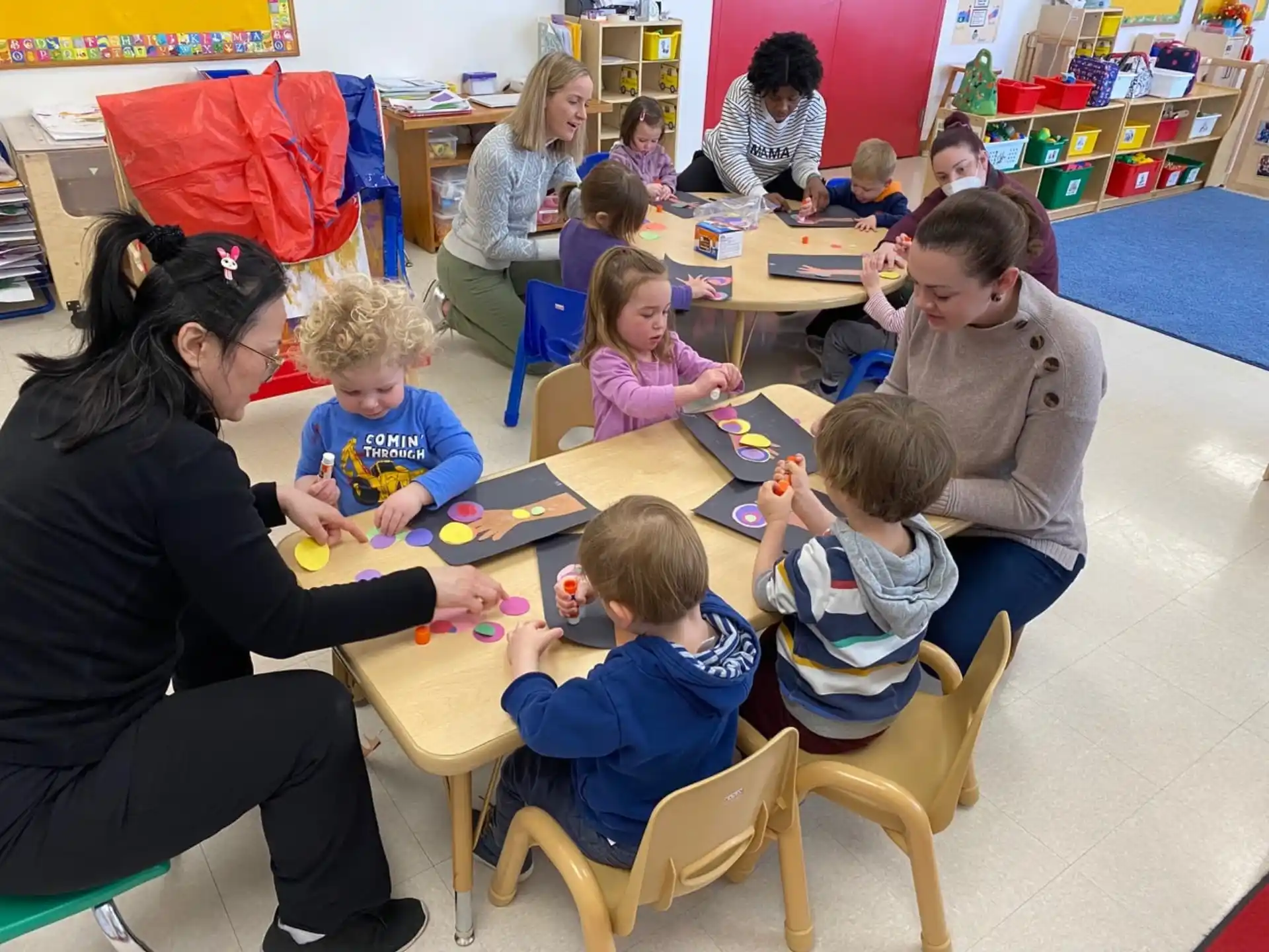 a person teaching children in a classroom