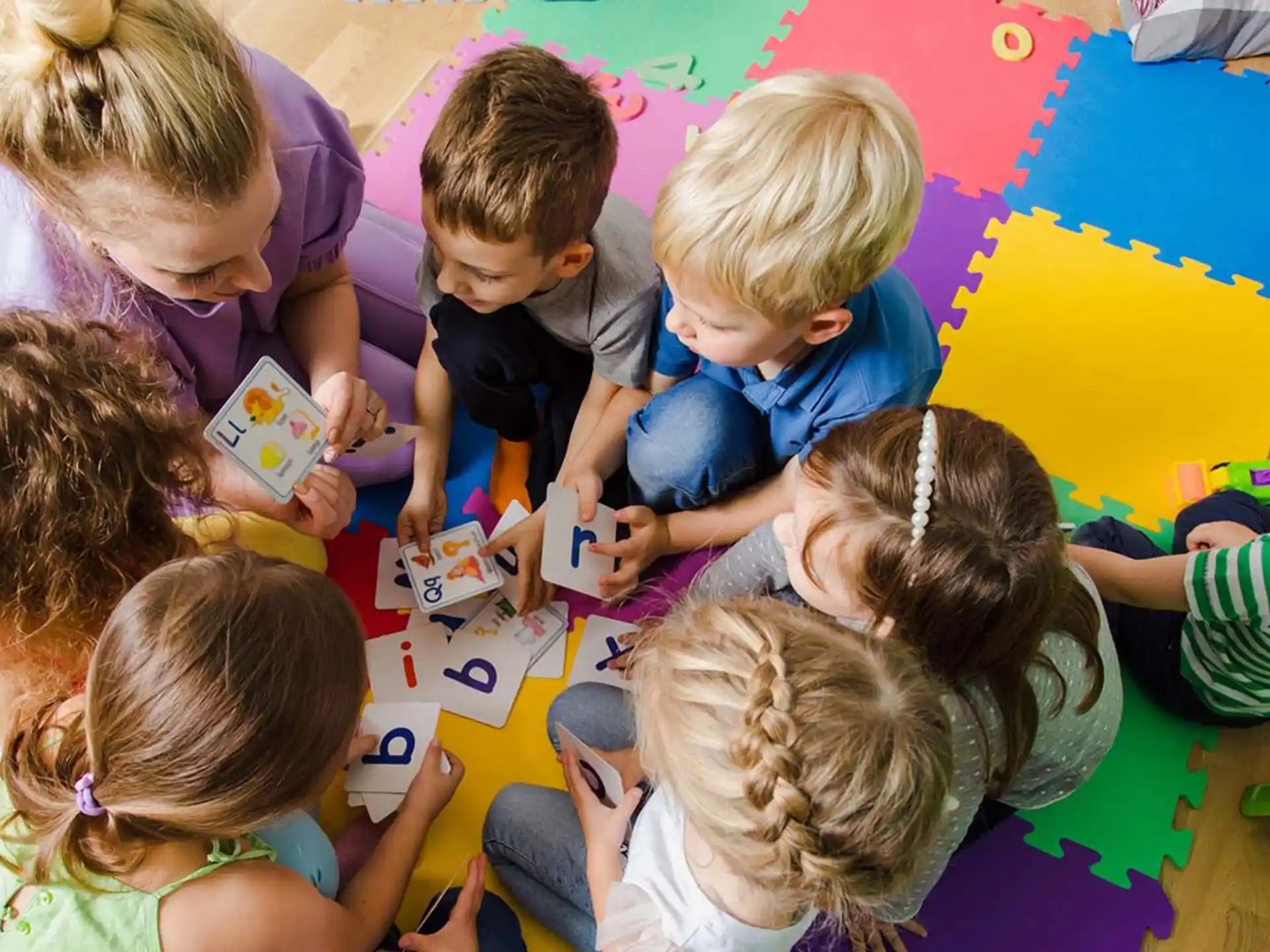 a group of children playing with toys