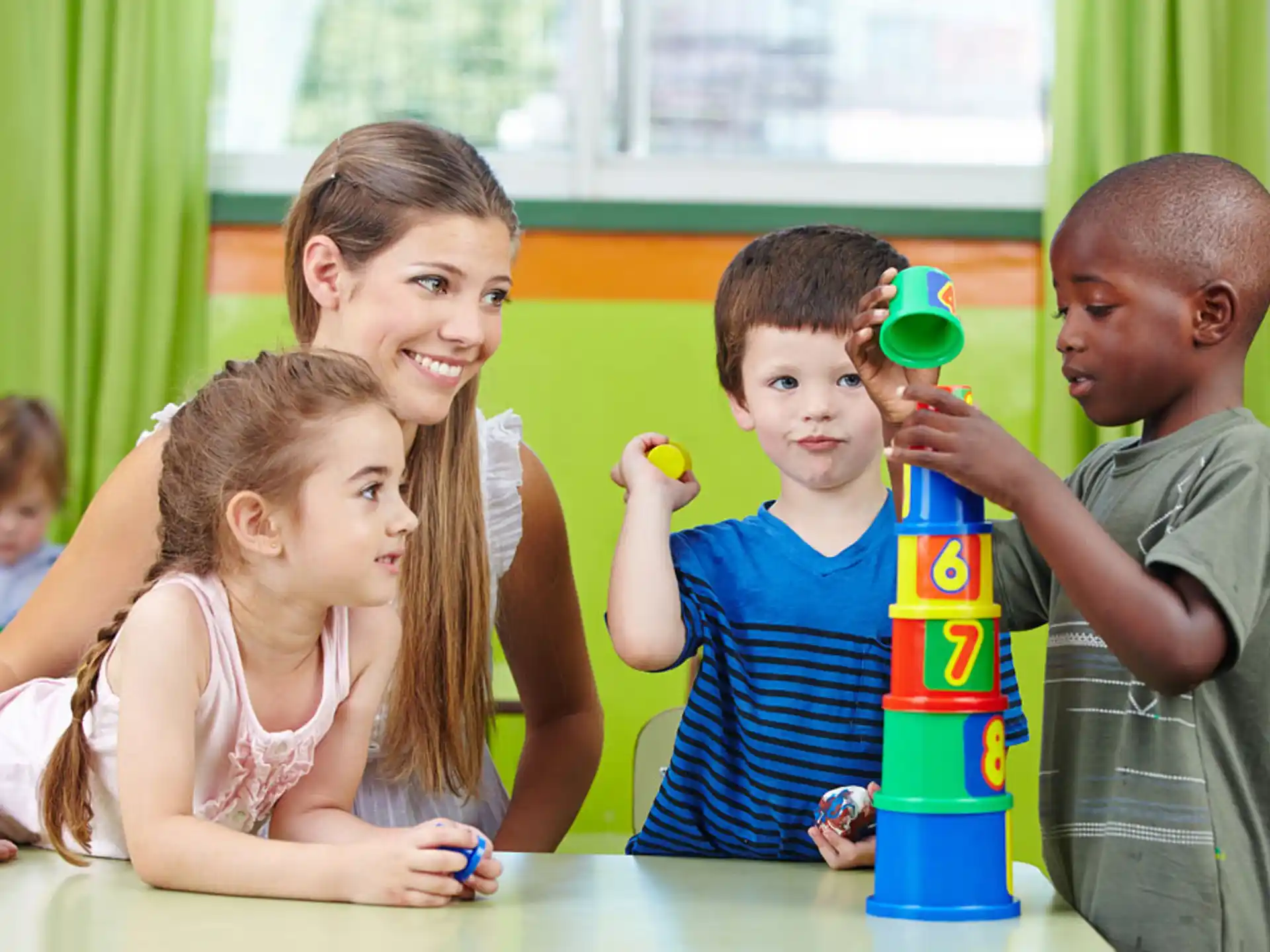a group of children playing with toys