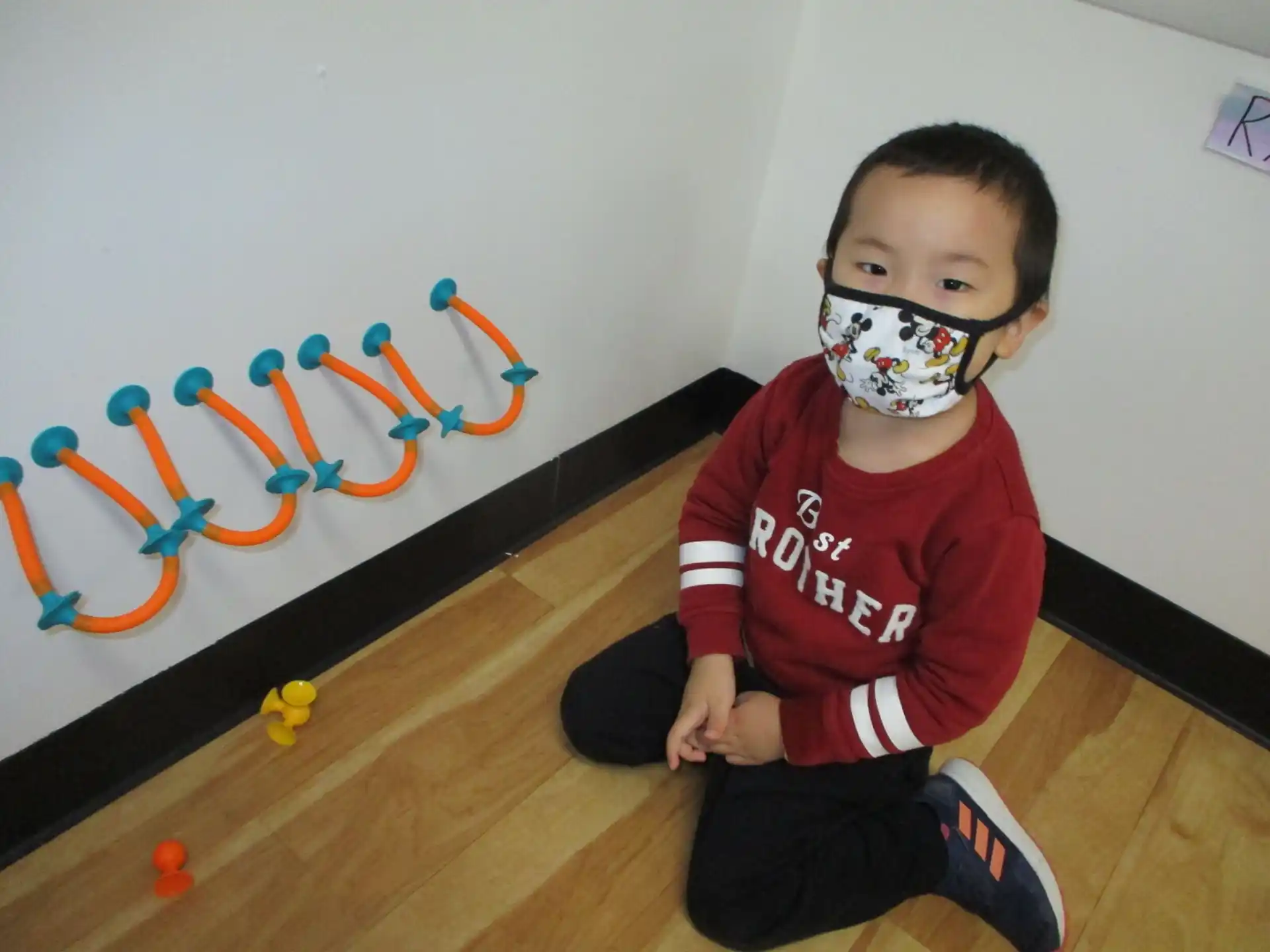 a child with a face mask