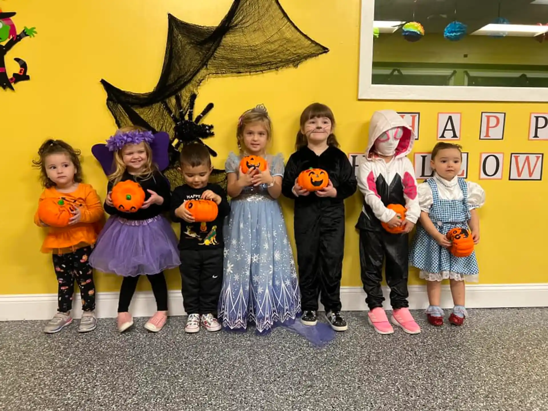 a group of children posing for a photo
