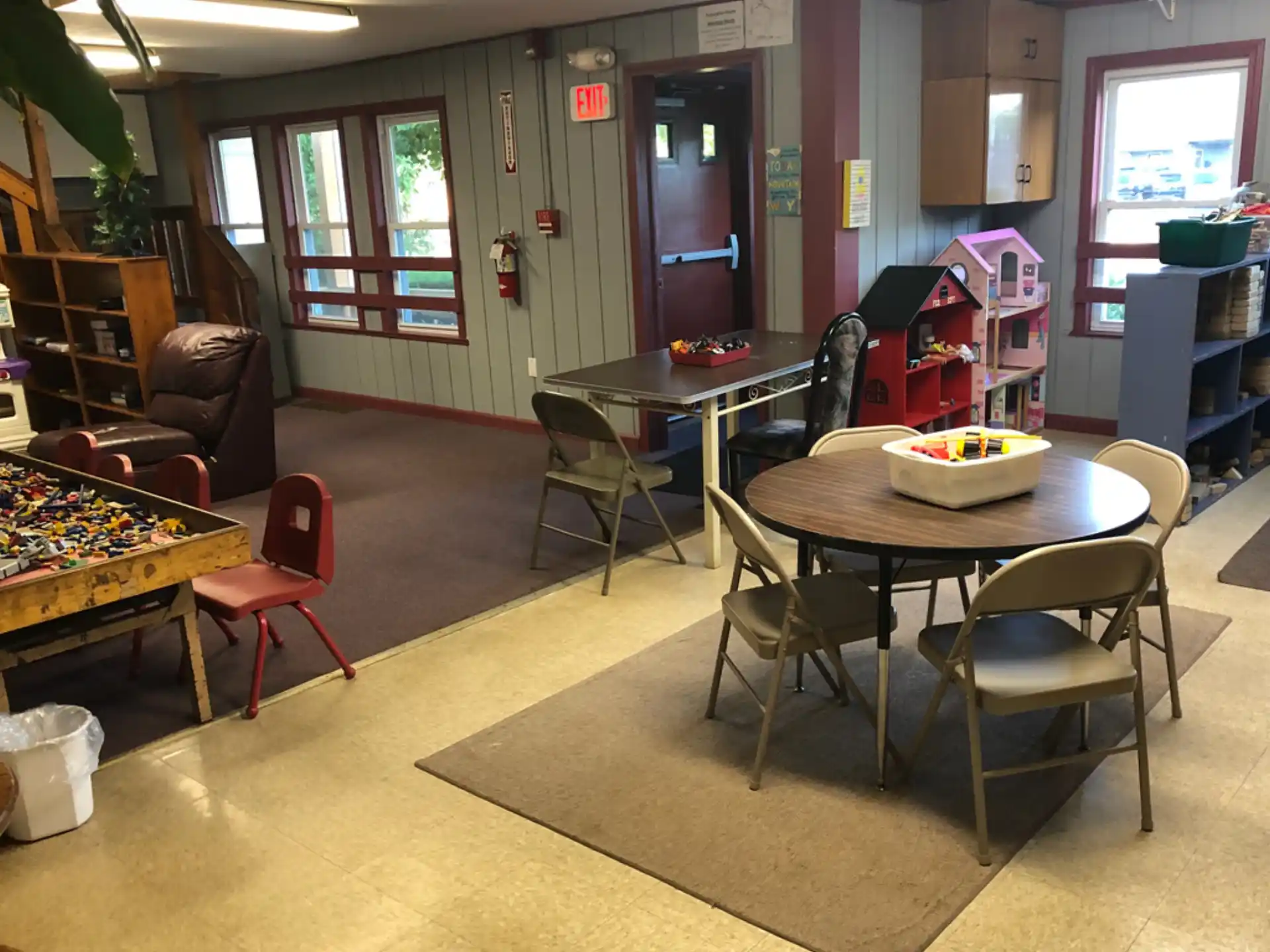a room with tables and chairs