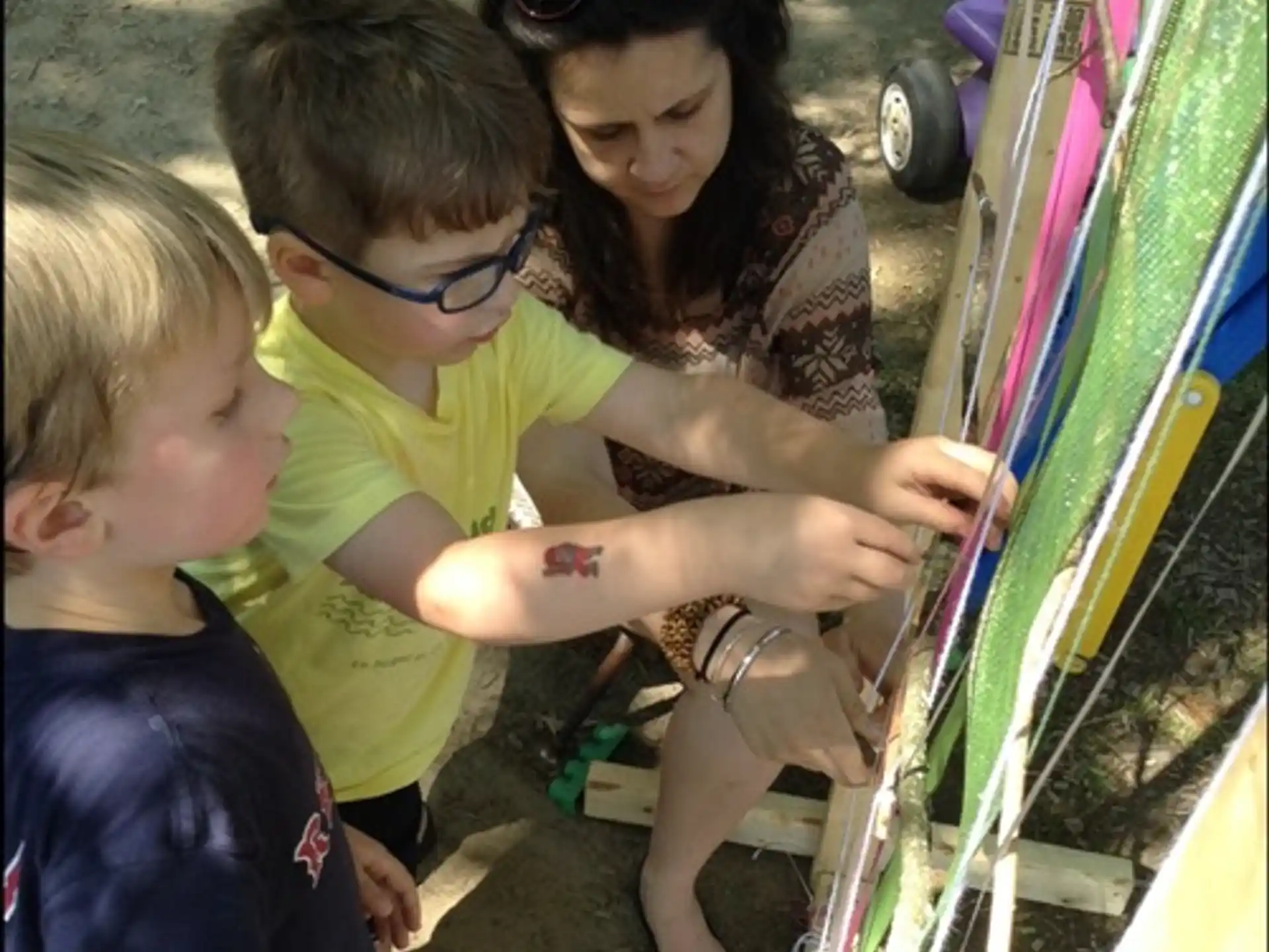 a person and two boys