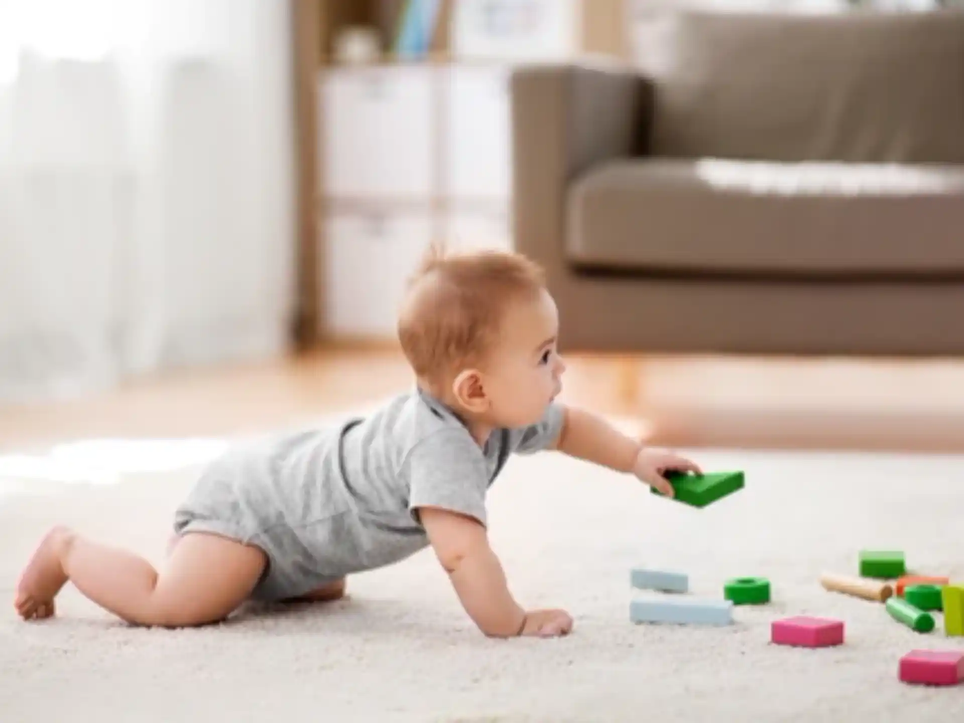 a baby playing with toys