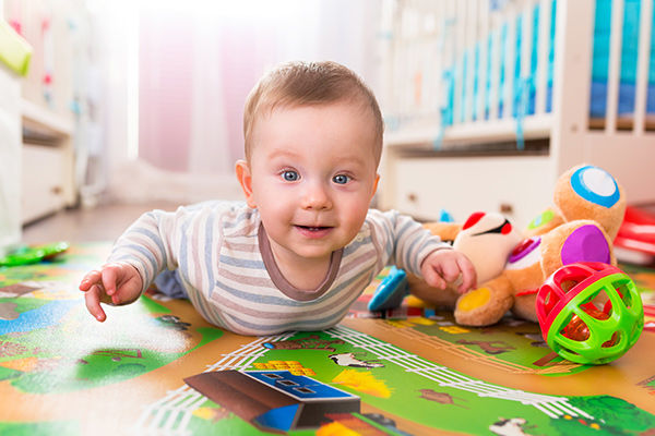 a baby playing with toys