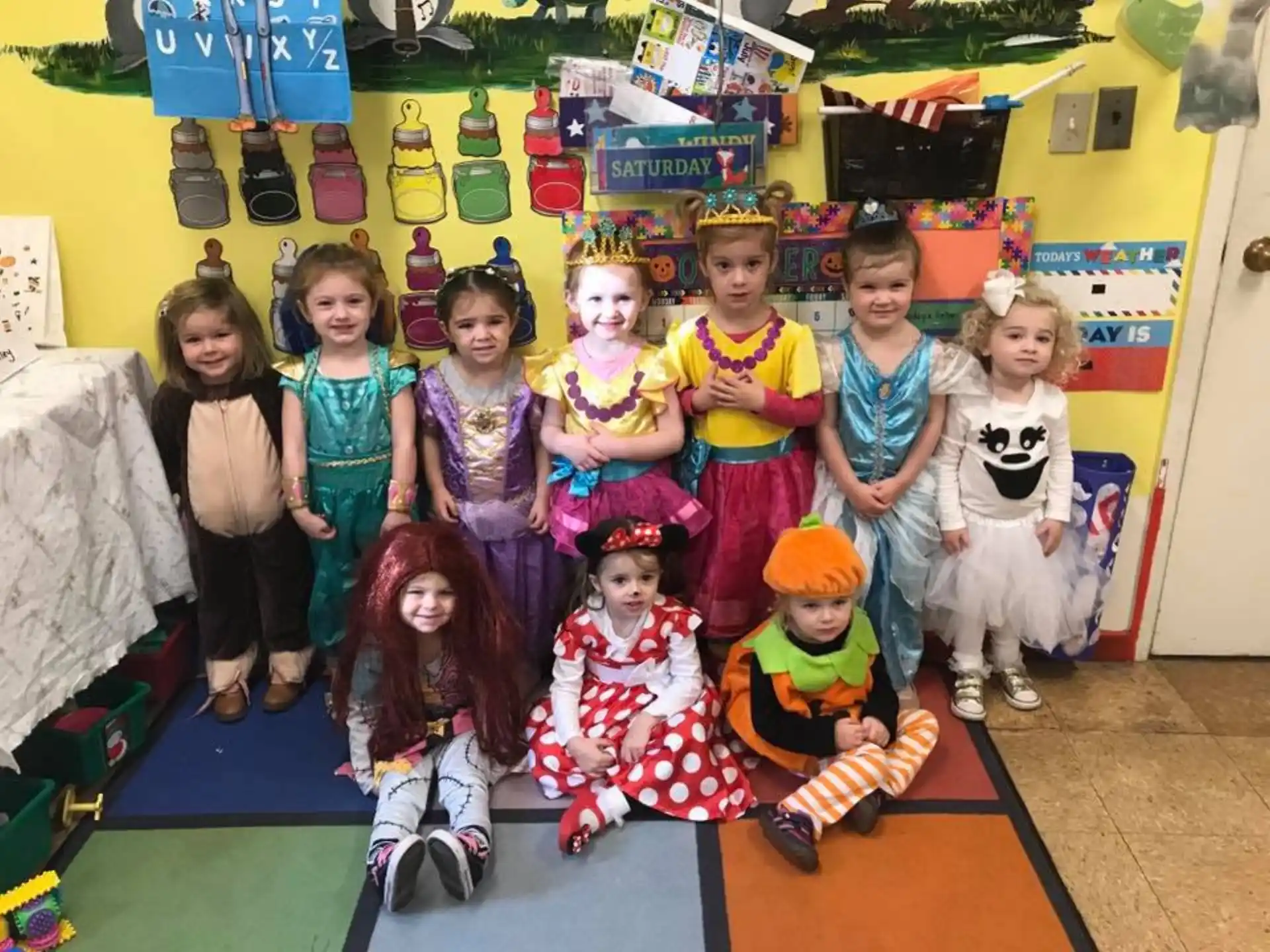 a group of children posing for a photo