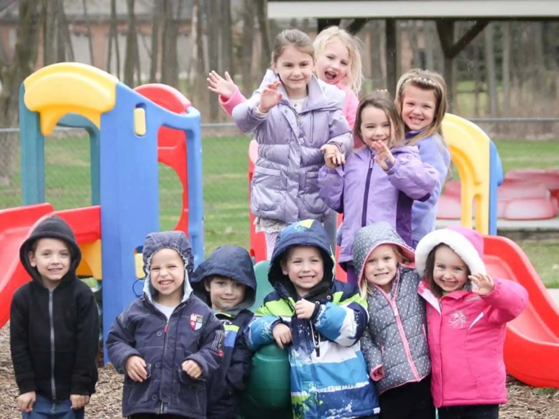 a group of children posing for a photo