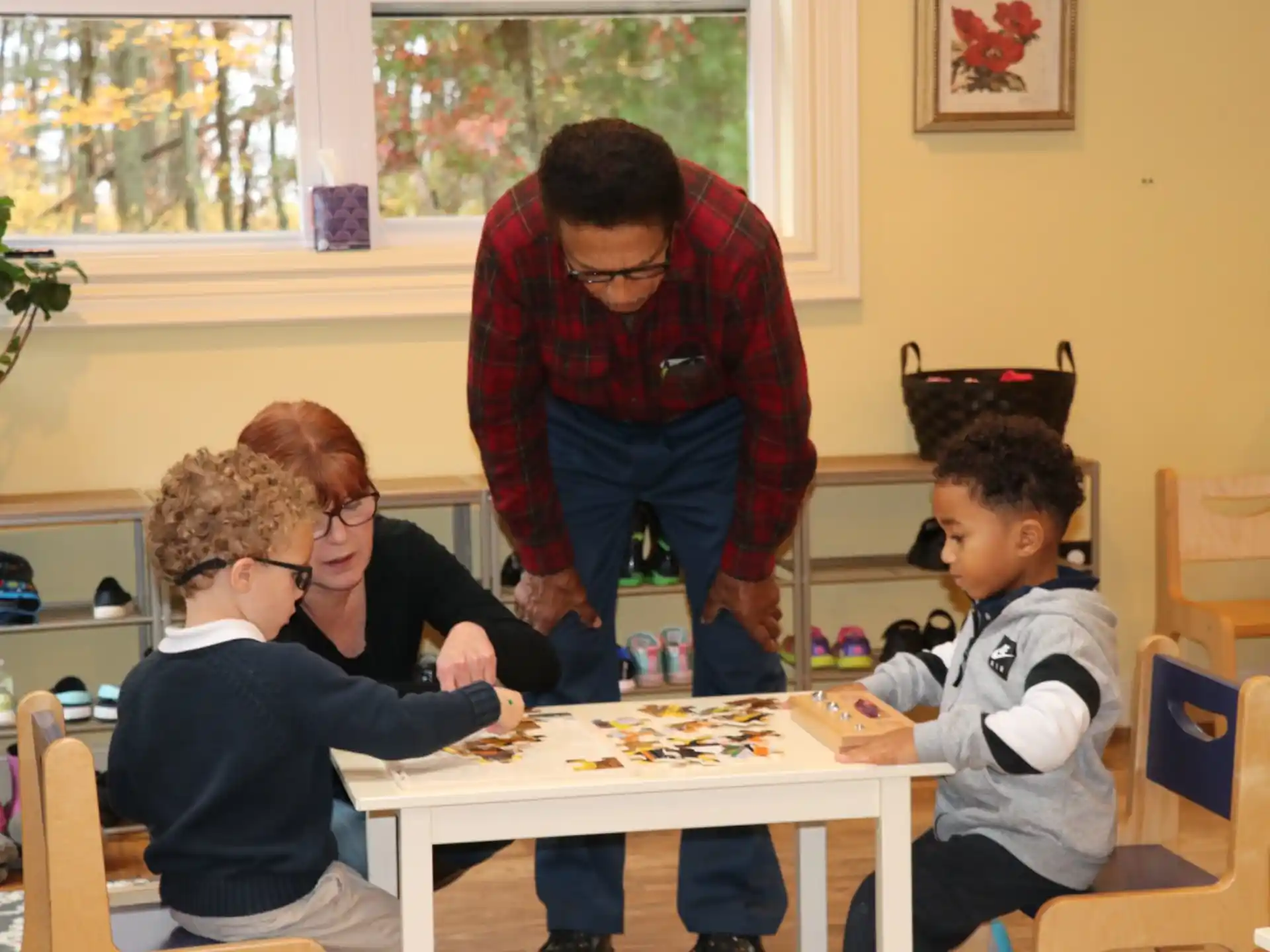 a group of people playing a board game
