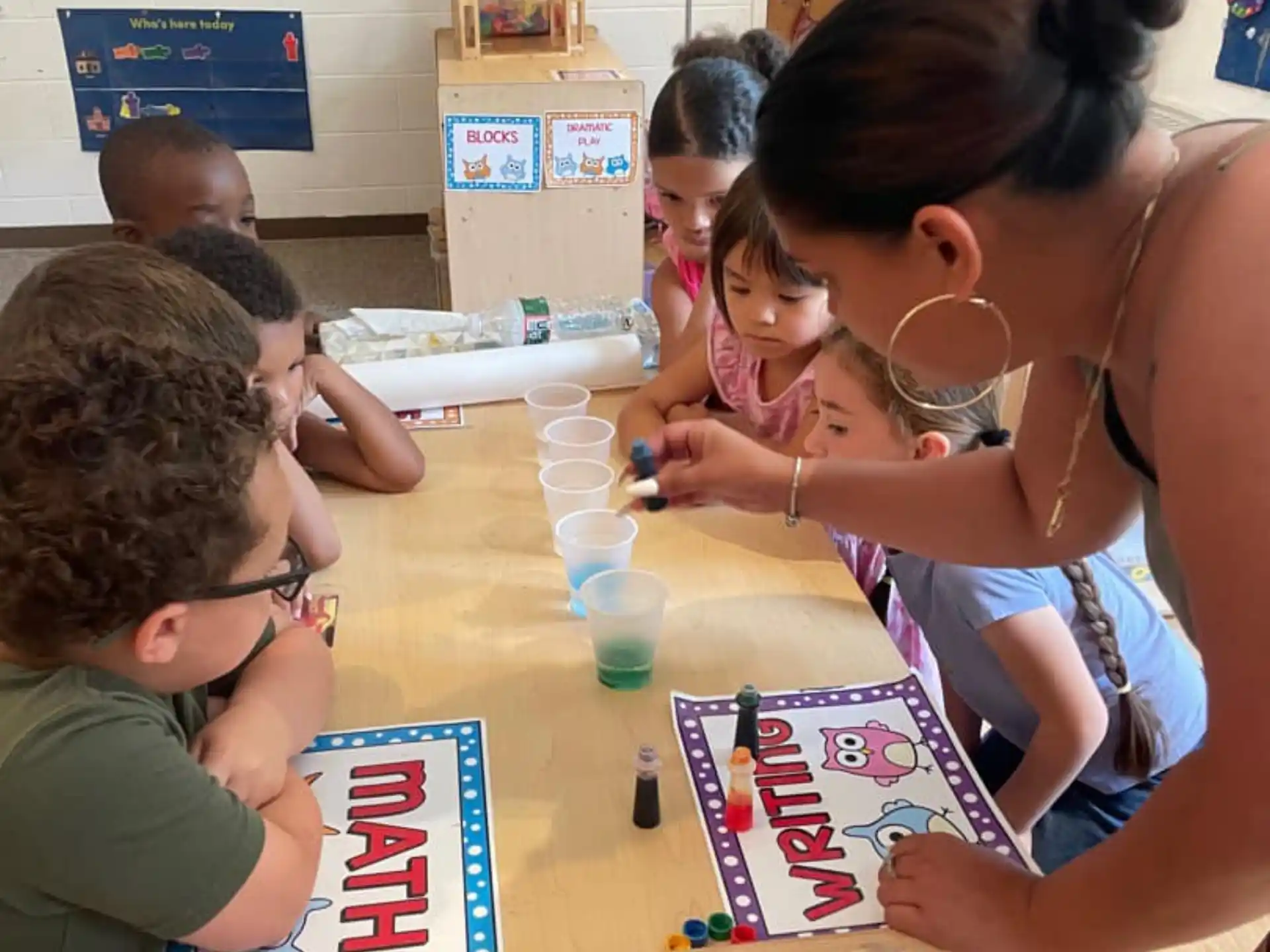 a group of children playing a board game
