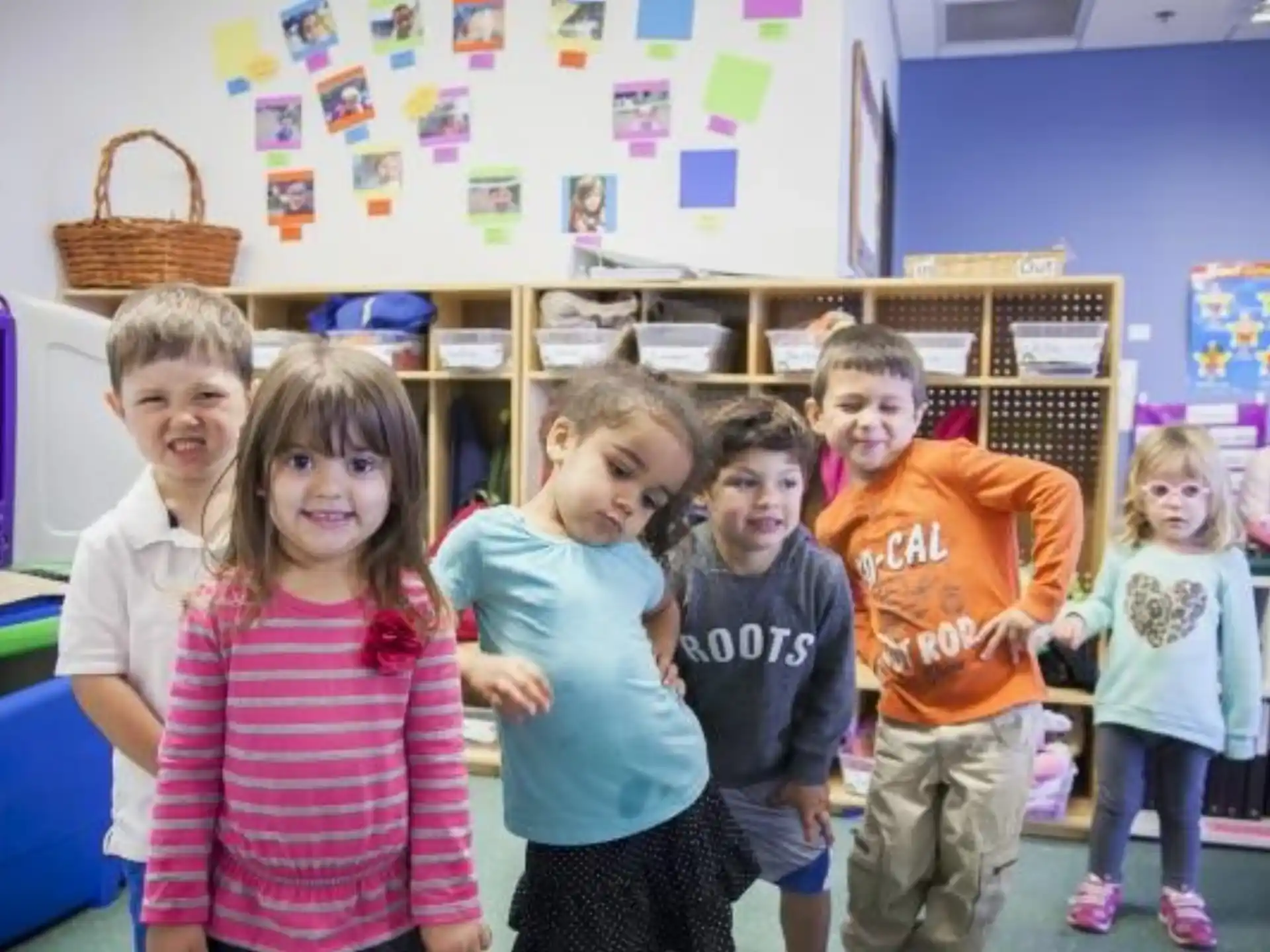 a group of children posing for a photo