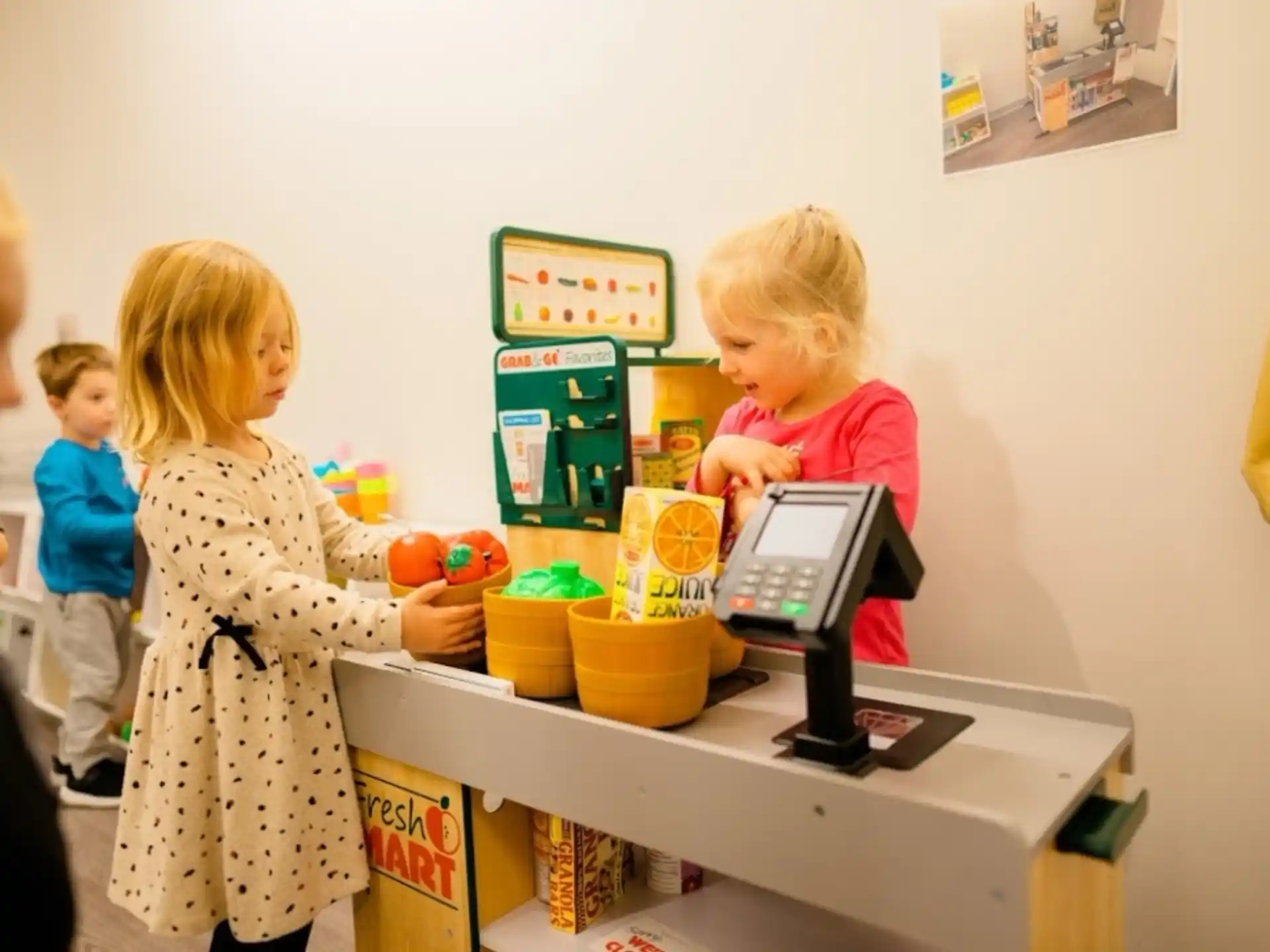 a group of children playing with toys