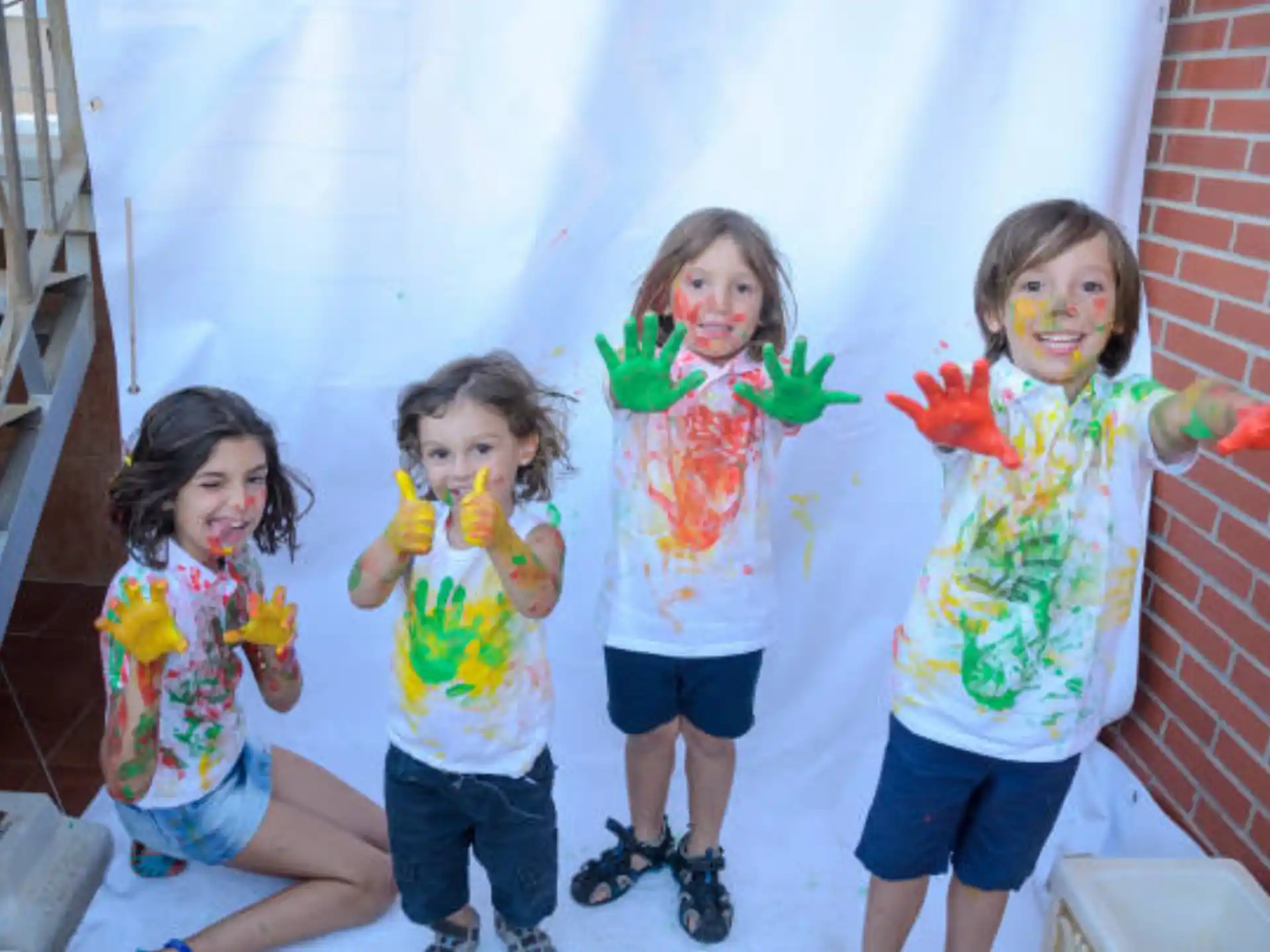 a group of children holding flowers