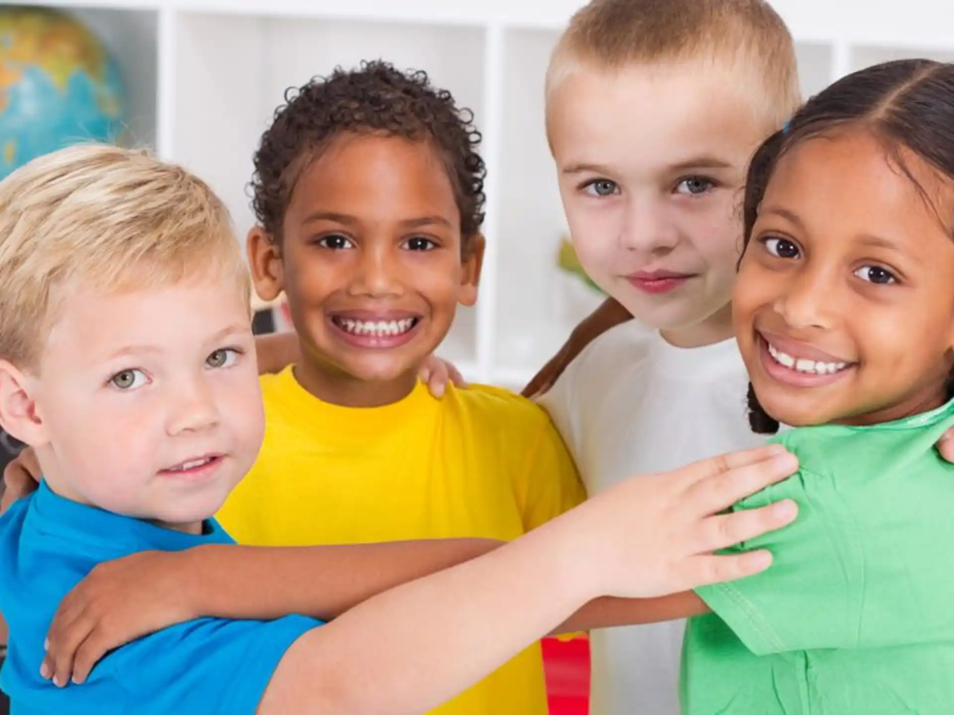 a group of children posing for a photo