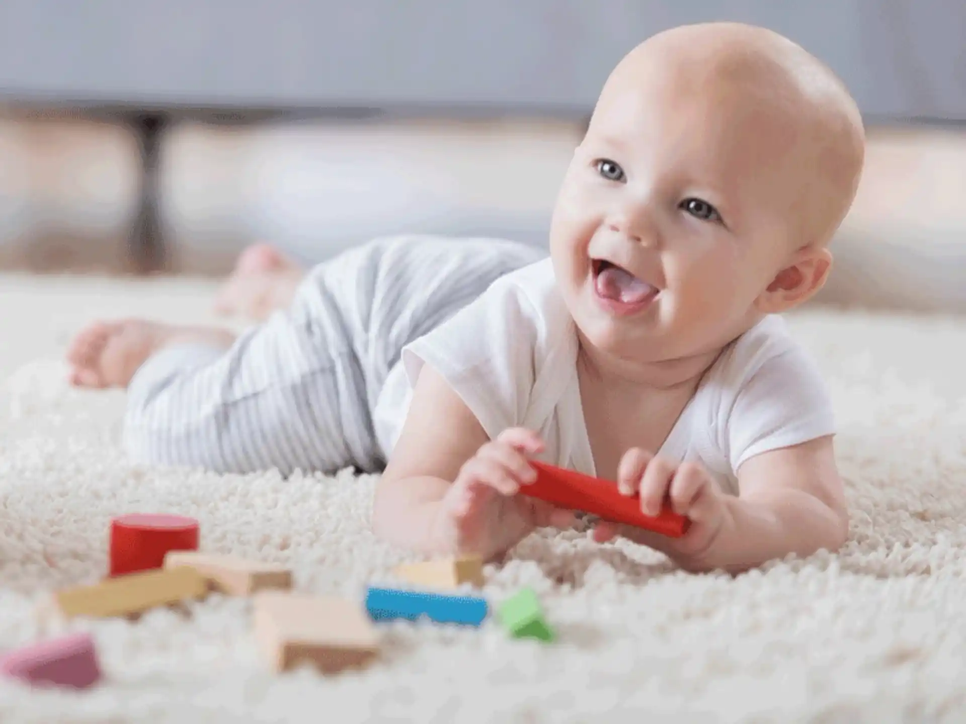 a baby playing with toys