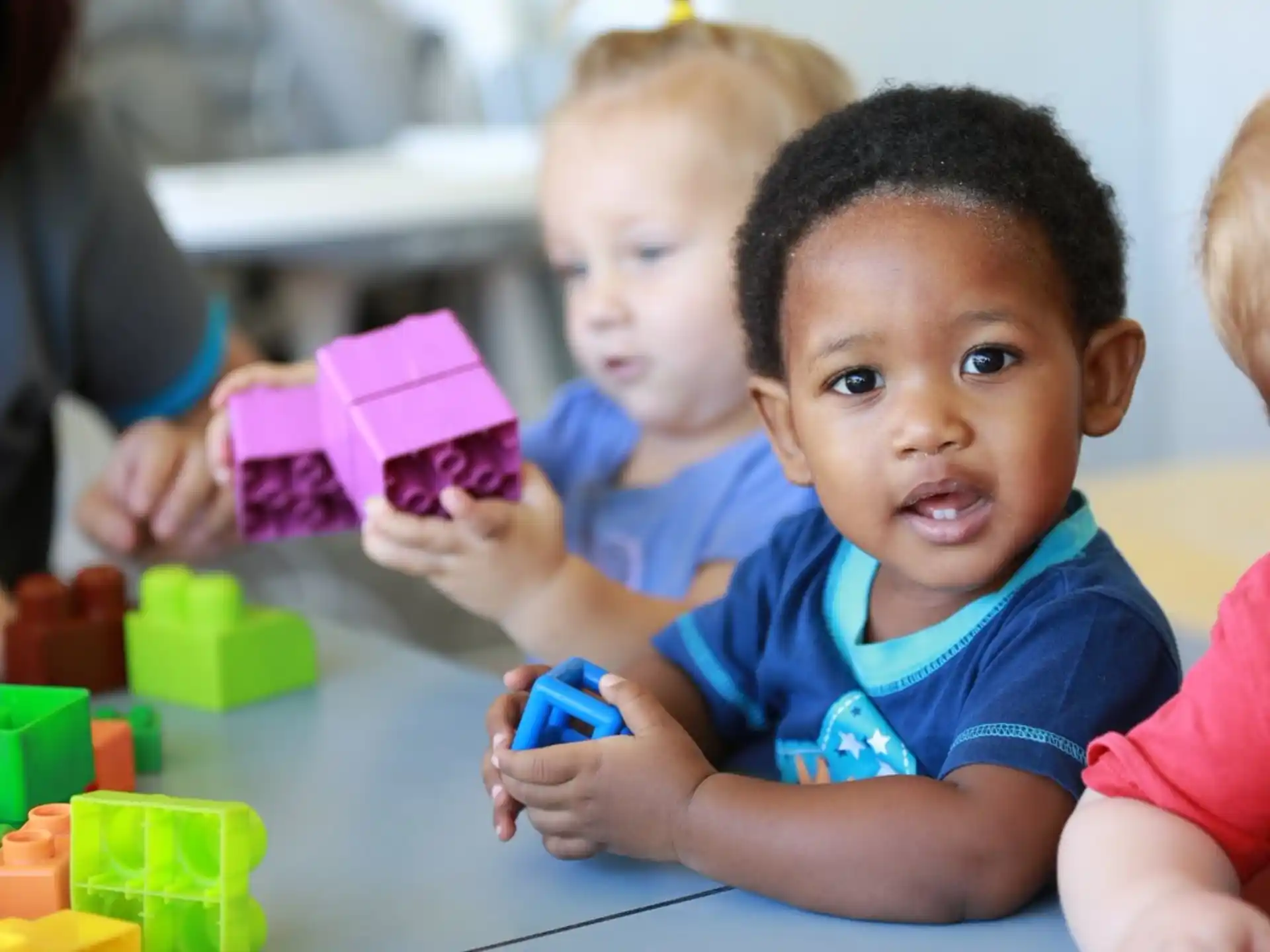a few children playing with toys