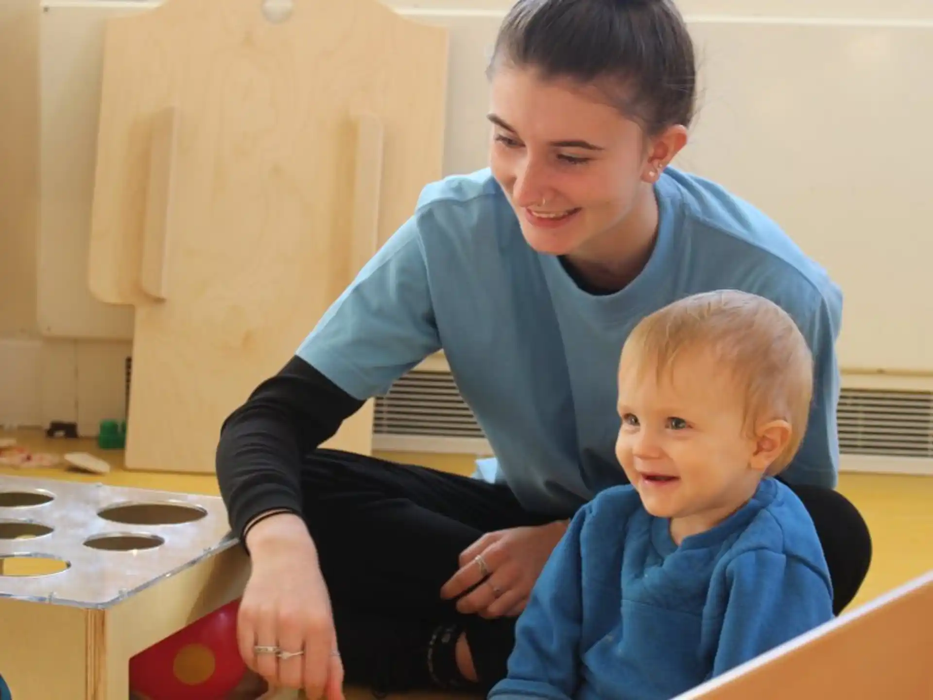 a person holding a baby