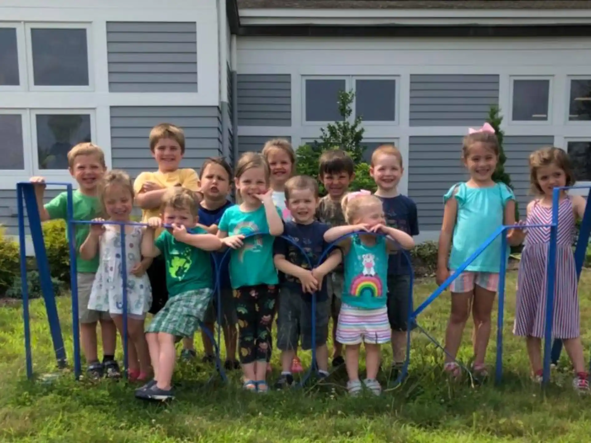 a group of children posing for a photo